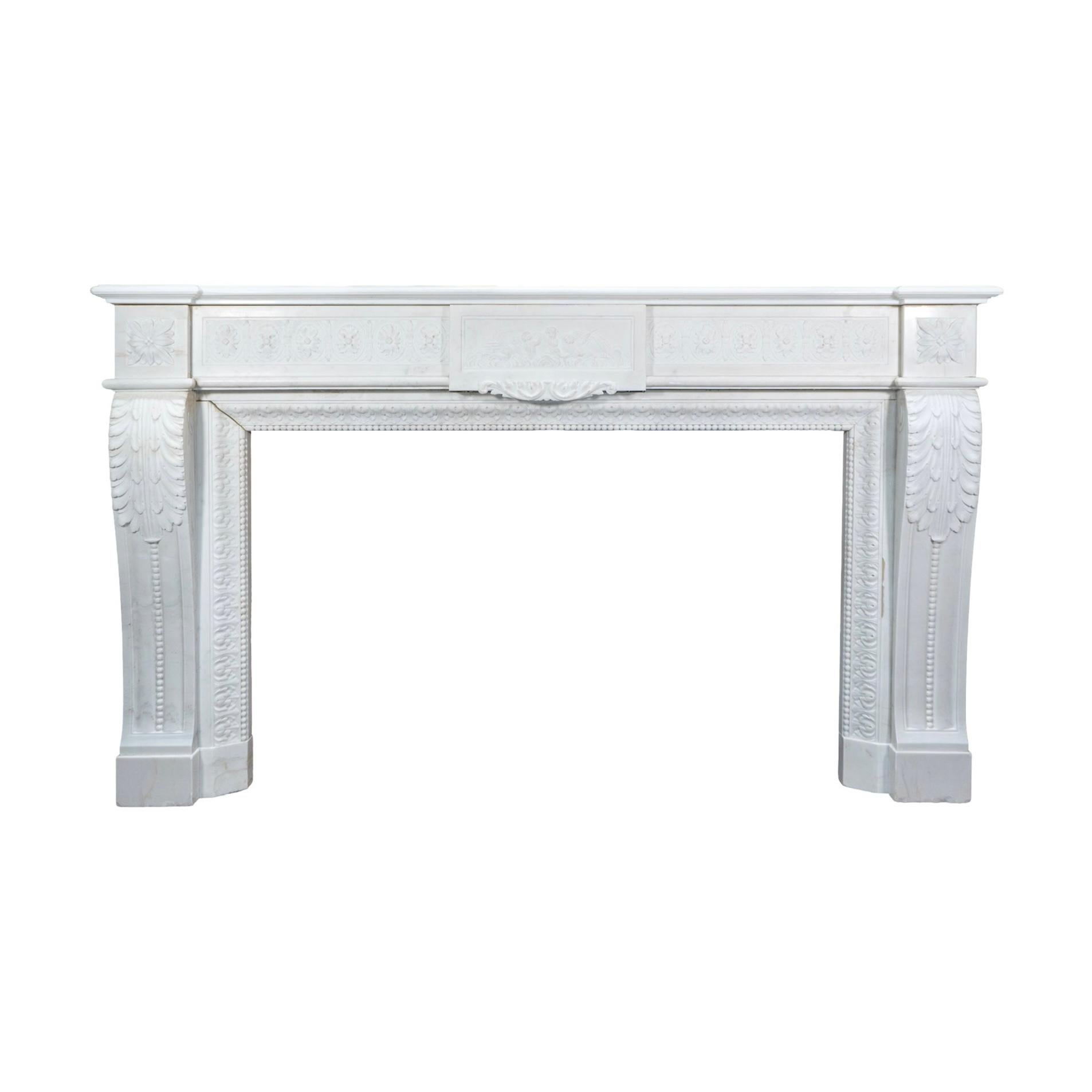 This French White Veined Carrara Marble Mantel is a stunning display of Louis XVI style, with intricate carvings throughout. Imported from France in the 1850s, this mantel is made of high-quality white veined Carrara marble. Aesthetically pleasing