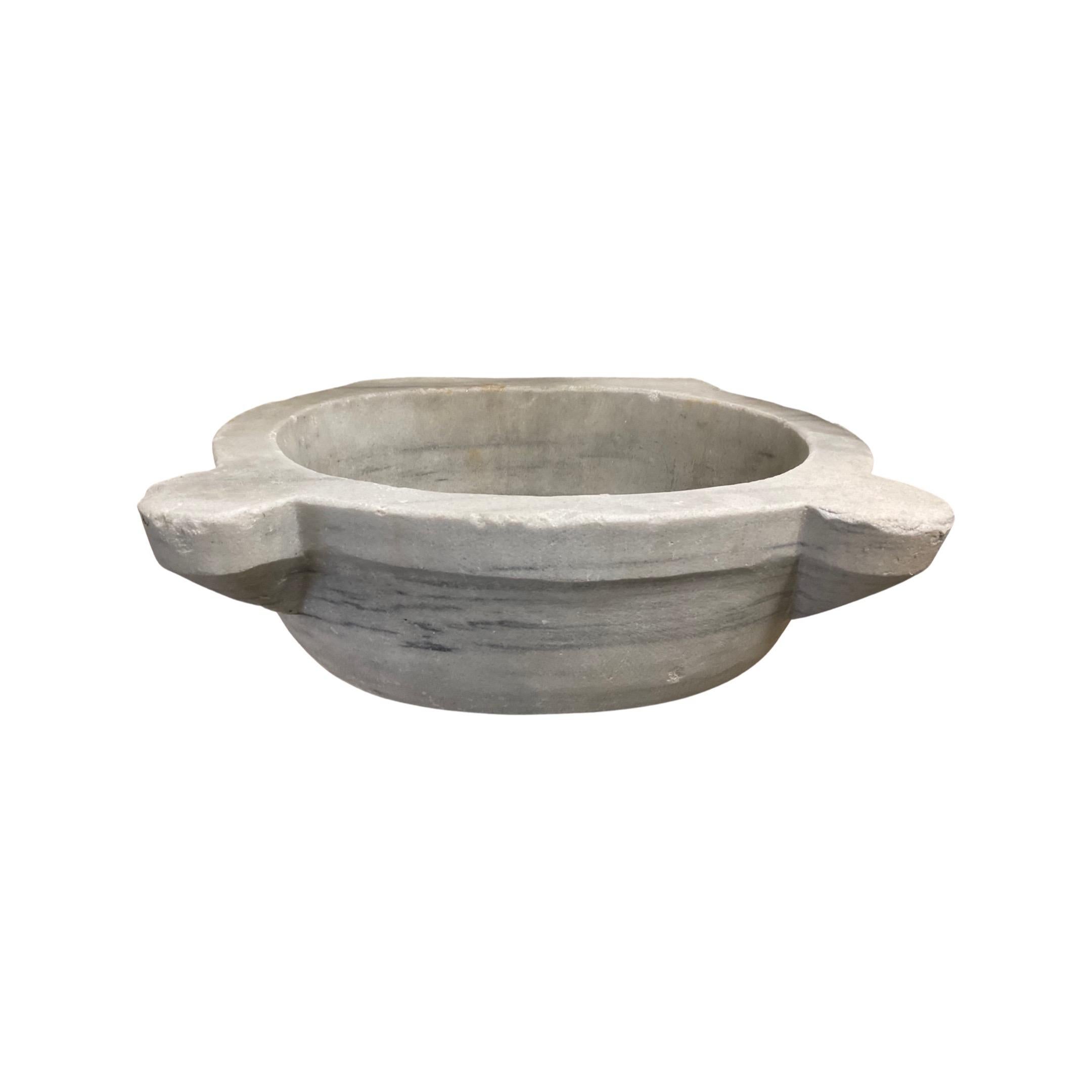 The perfect choice for those looking for an 18th century style sink, this French white marble sink boasts a classic design and is crafted with durable, long lasting material. A timeless addition to any home, it provides both style and function.