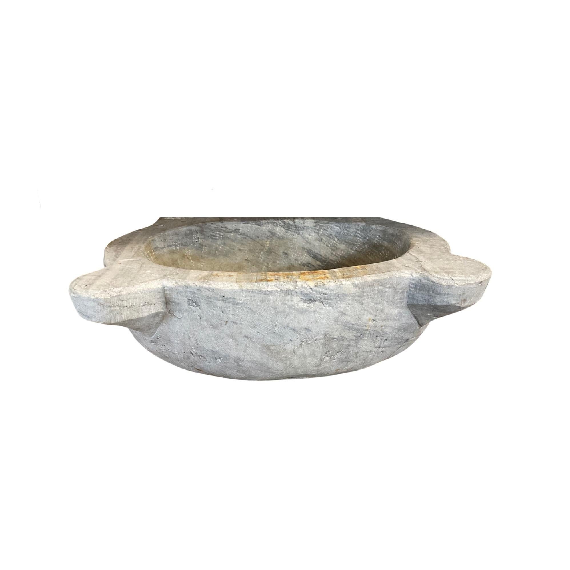 This French white marble sink is crafted from solid marble. Its unique texture and grain structure is ideal for adding a Classic and luxurious feel to any bathroom. Its durable surface is easy to clean and maintain, and its stylish design will be a