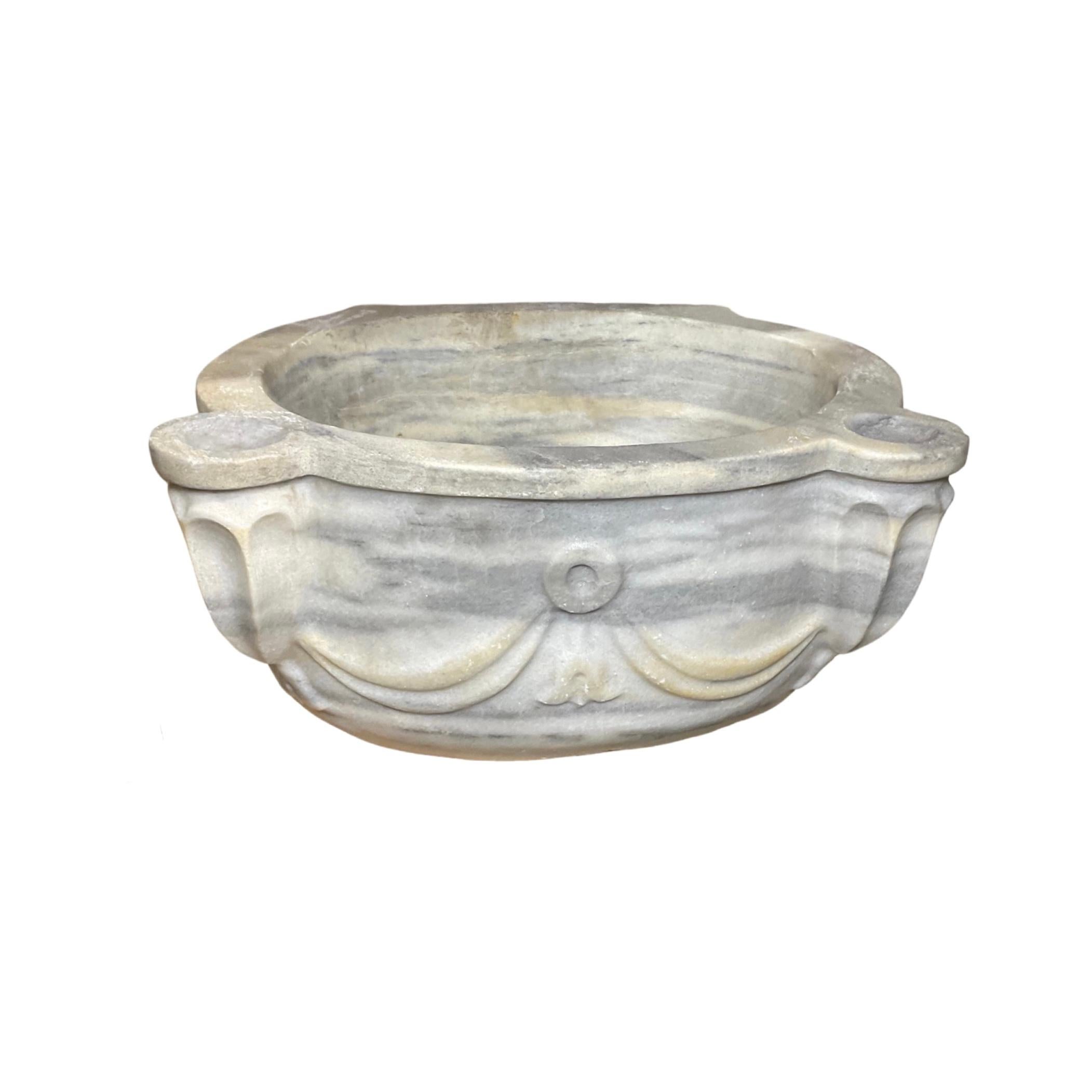 This stunning French White Marble Sink is an exact replica of the ones installed in palaces during the 18th century. Its timeless look and classic design will easily elevate the style of any bathroom.