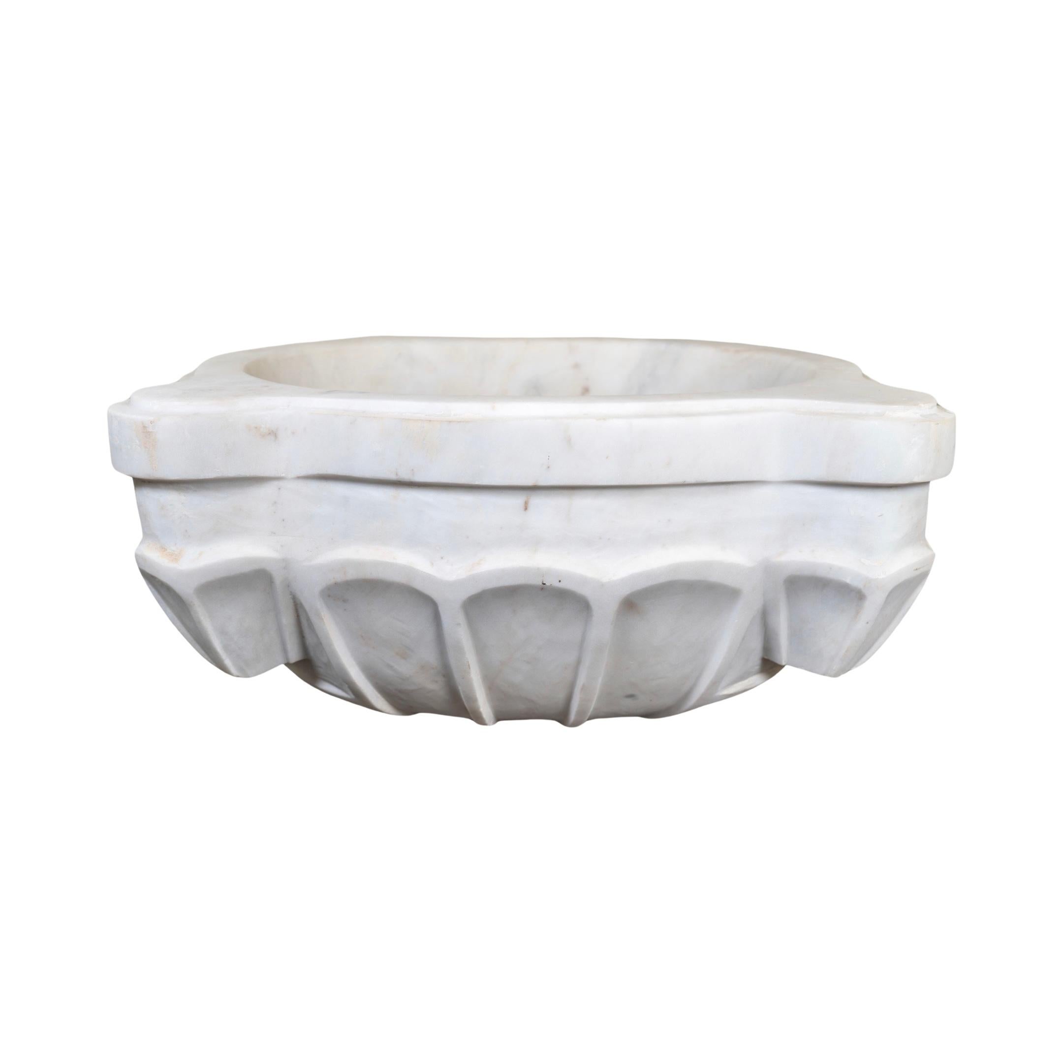 This high-quality French White Marble Sink is an authentic reproduction from the 18th century. It is crafted from luxurious marble and offers superior strength, durability, and aesthetic appeal. Its timeless design and superior material make it an