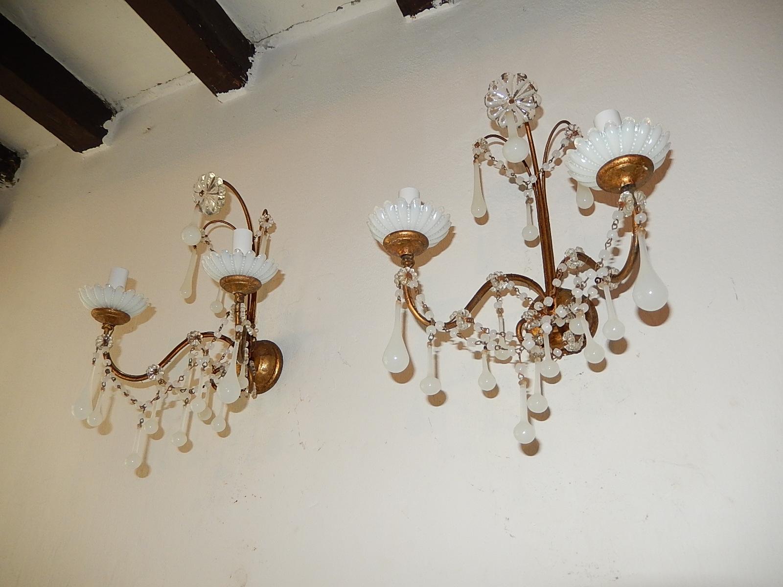 Housing two lights each. Will be rewired with appropriate sockets for country and ready to hang. White opaline bobeches, drops and swags of beads. Giltwood posts and back plate. Big crystal floret on top. Free priority UPS shipping from Italy, no