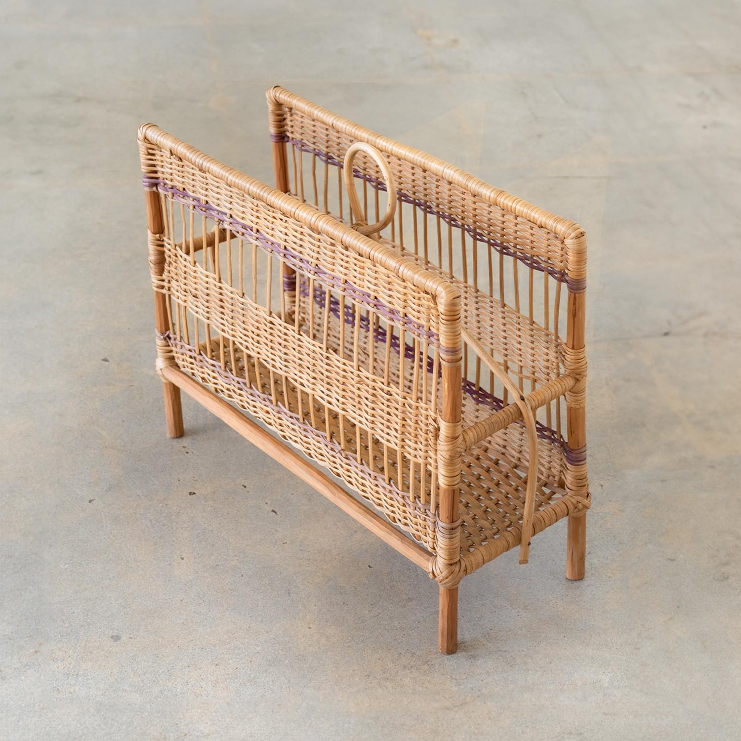 Beautiful wicker and bamboo magazine rack from France, 1960s. Looped rattan handle detail and original woven wicker sides. Nice age and patina throughout.