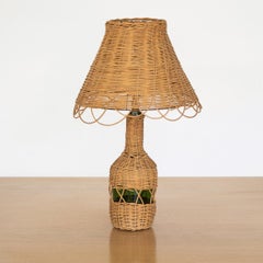 French Wicker and Glass Bottle Lamp