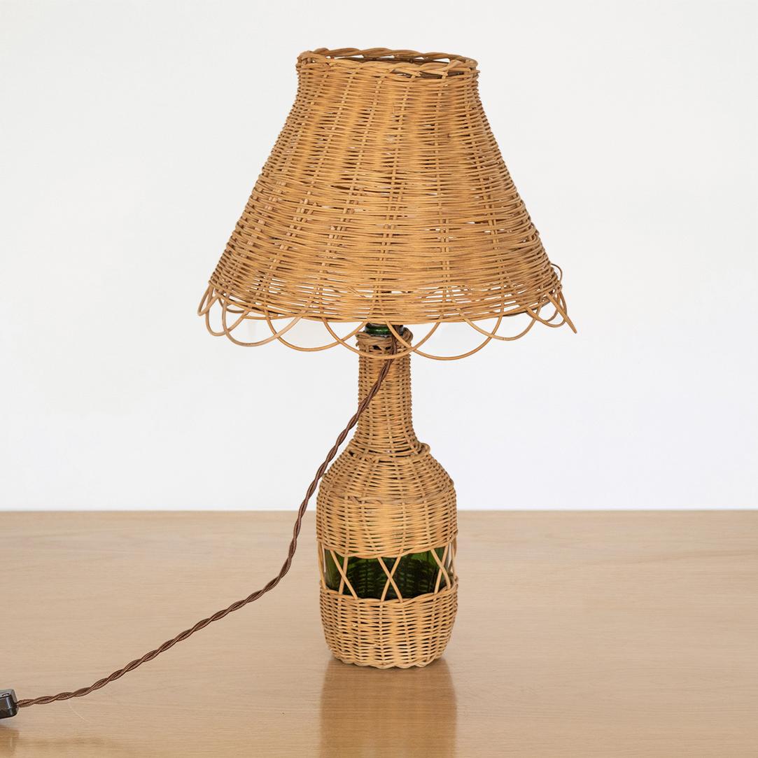 French Wicker and Glass Bottle Lamp In Good Condition In Los Angeles, CA