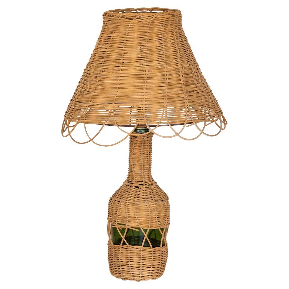 French Wicker and Glass Bottle Lamp