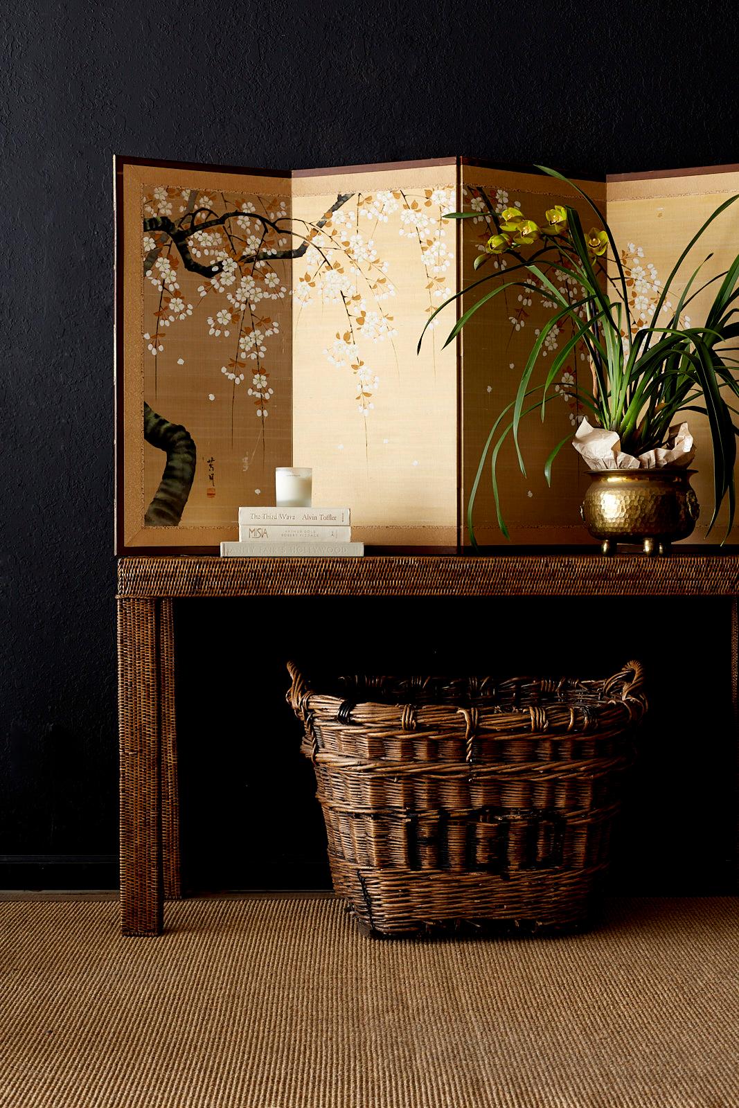 Rustic French harvest basket from the Champagne region constructed from wicker reeds. Initialled on both sides HQD with handles on top and reinforced with wire. Supported by wood runners on the bottom. Wonderful display piece with a rich patina and