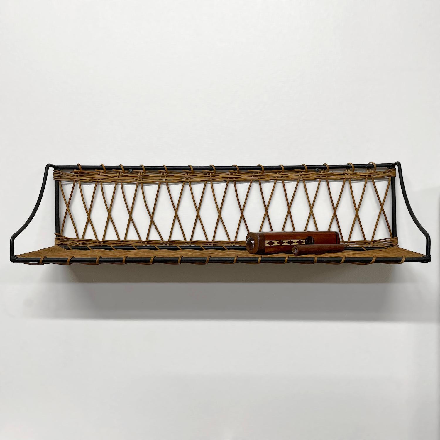 French wicker & iron shelf
France, circa 1950’s
Clean lines, beautiful and functional
Can be mounted two ways
Intricately woven wicker delicately wraps sturdy iron frame
Natural color variations
Patina from age and use