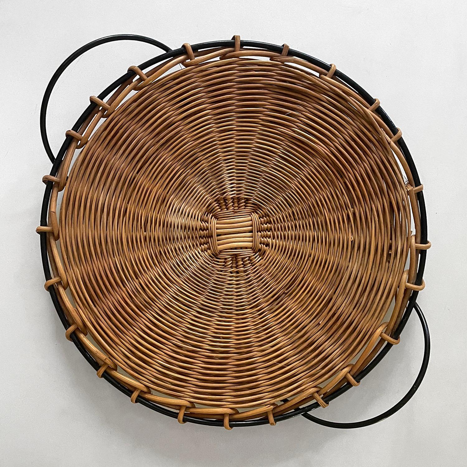 French wicker & iron tray in the style of Raoul Guys 
France, circa 1950’s
Hand woven wicker tray with beautiful attention to detail
Minor imperfections and wicker loss 
Patina from age and use
Perfectly imperfect