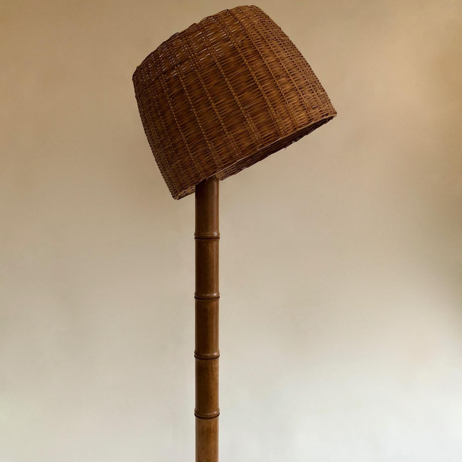 French Wicker Rattan and bamboo shaped wooden floor lamp, Lampadaire 1950s, possibly earlier. Unusual Tilting shade.