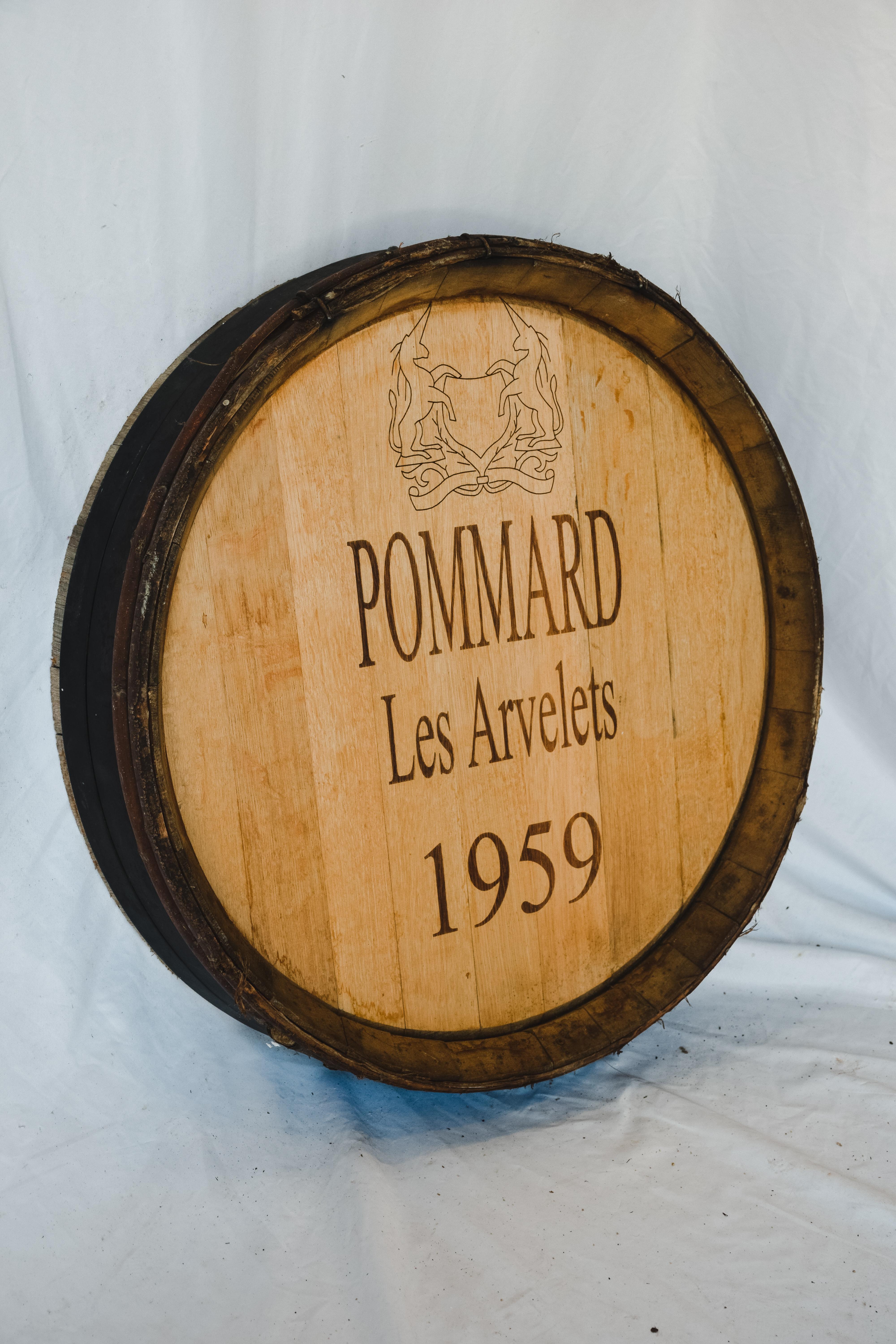 This Antique Wine Barrel Façade comes out of the wine cellars in France. The character and aged wood give it perfect presentation to hang in your wine room or any living space. The Pommard Les Arvelets 1959 custom stamp was added at a later date.