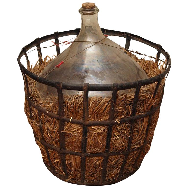 FRENCH WINE JUG WITH IRON STORAGE CAGE For Sale