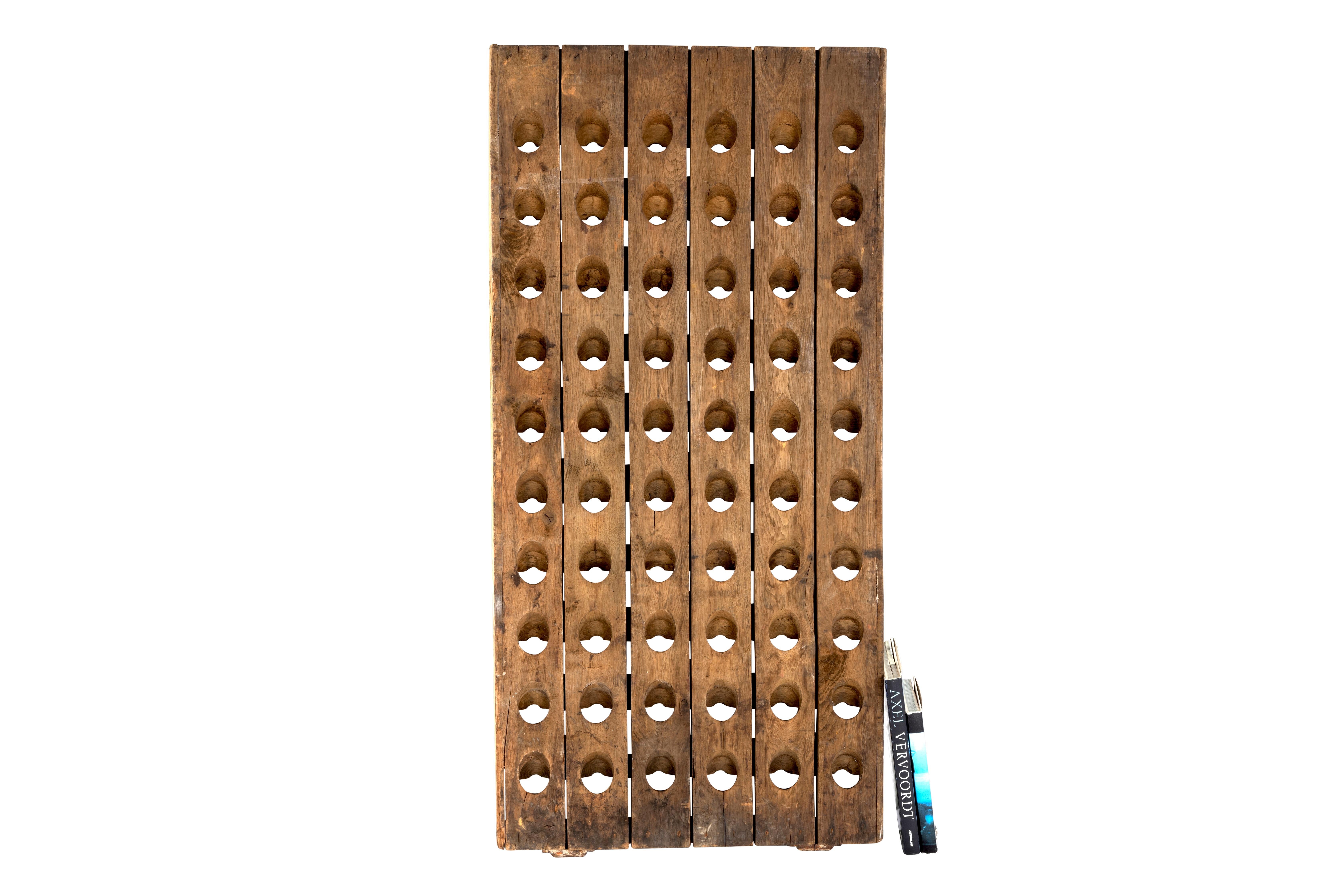 french wine bottle riddling wall rack