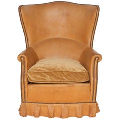 French Winged Leather Club Chair with Boxed Pleated Skirt