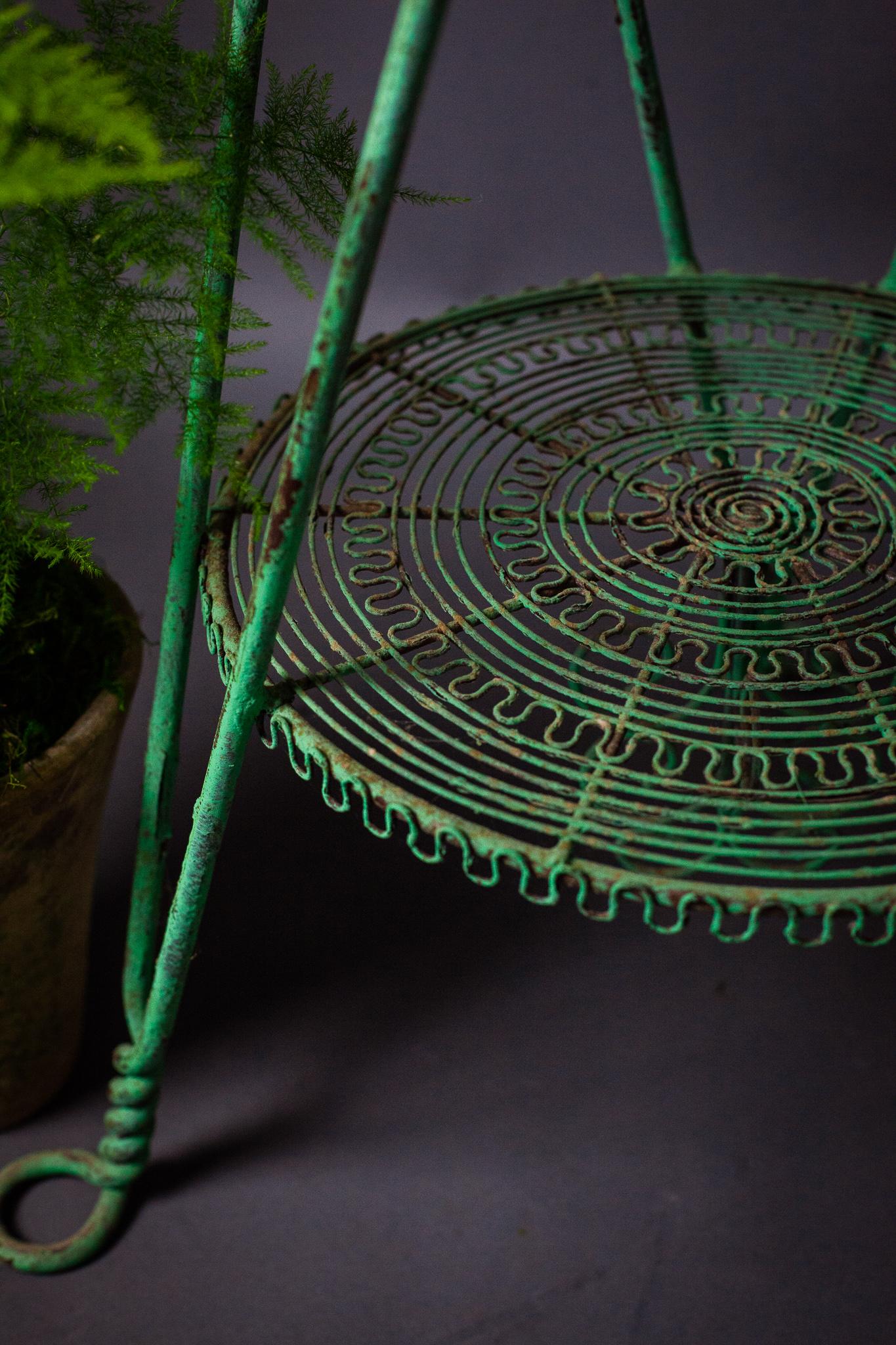 For your consideration, fleurdetroit presents to you this garden wire table. 
Antique garden table with fabulous little metal tassels.