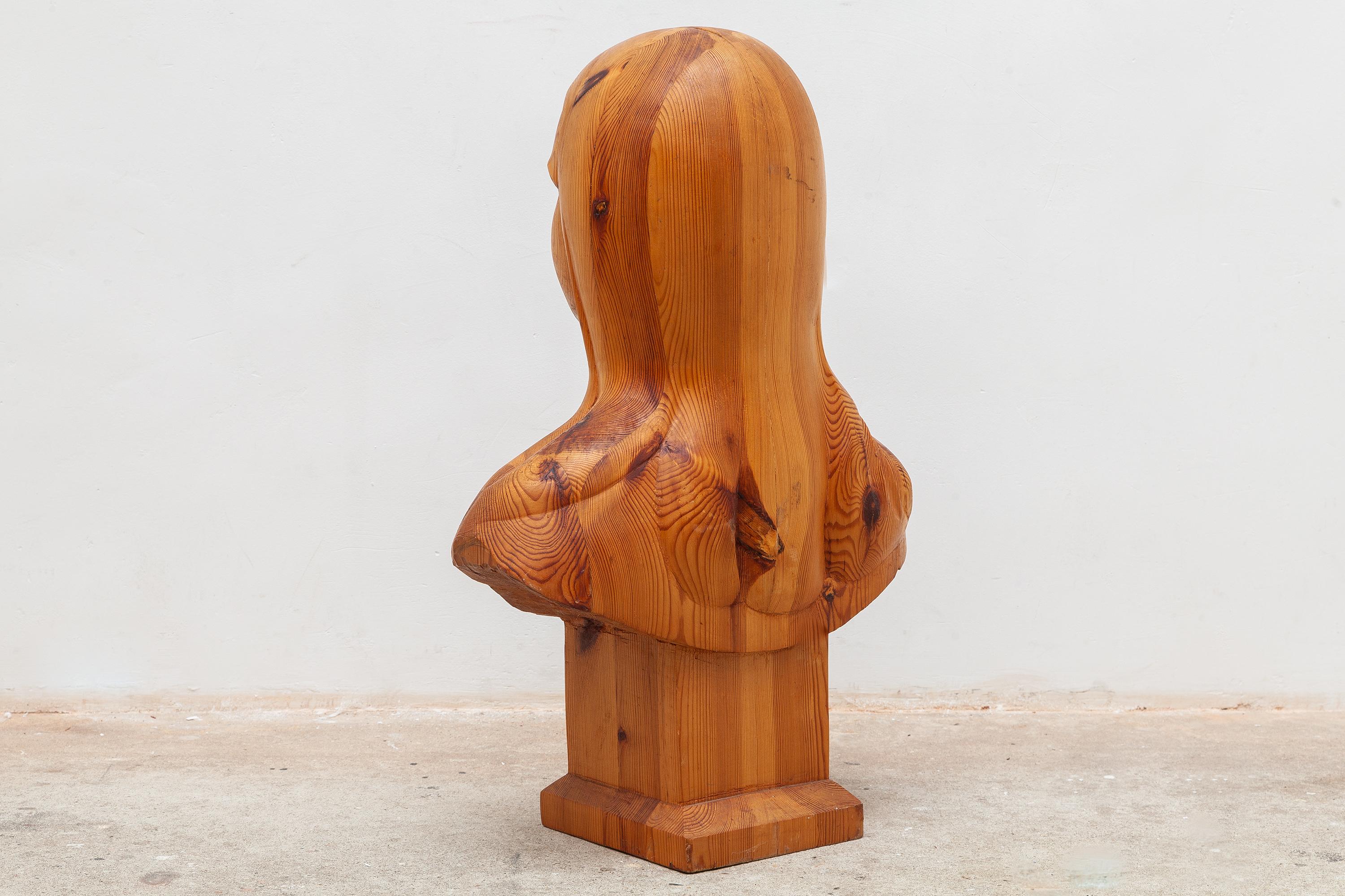 wooden bust sculpture