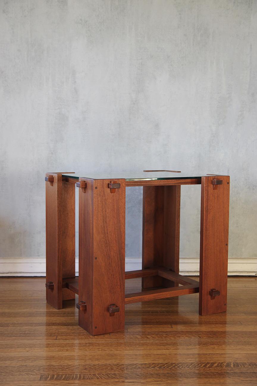 Unique geometrical puzzle side/ end table in the manners of Pierre Chapo with a glass top.
Perfect as a side table or end table.