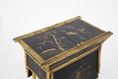 Meuble de rangement de style oriental en bois français et faux bambou doré