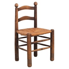 French Wood and Woven Chair by Charles Dudouyt