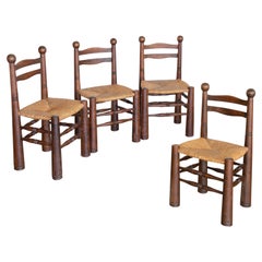 French Wood and Woven Chairs by Charles Dudouyt, Set of 4 French Wood and Woven Chairs by Charles Dudouyt, Set of 4
