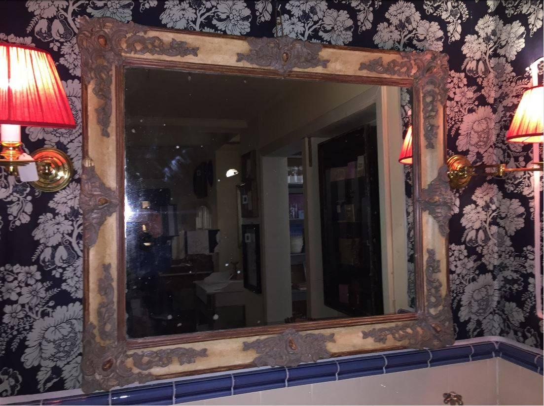 French mirror with wood painted and decorated mirror from 1880s.
This mirror could be placed both horizontal or vertical.