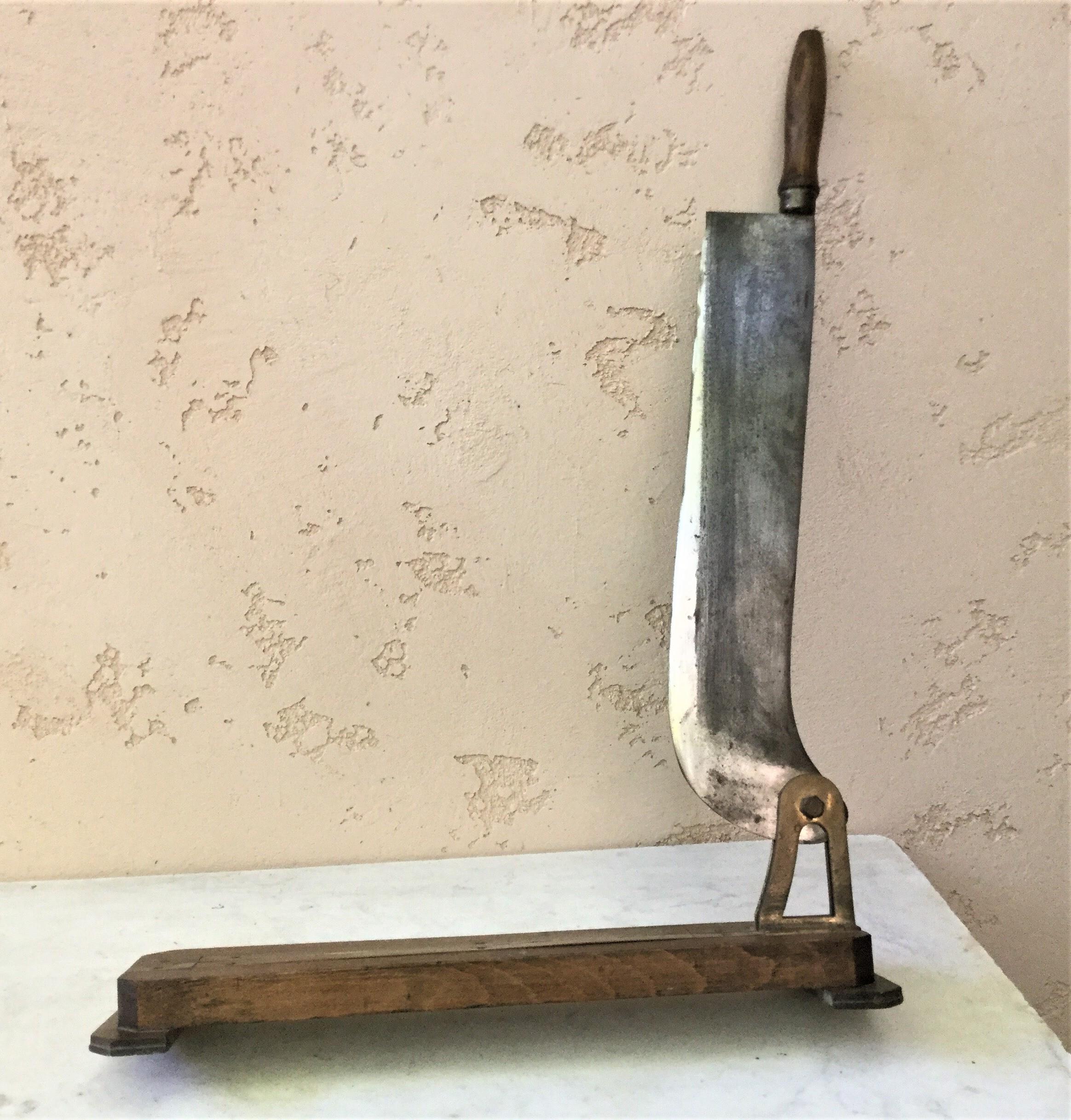 Large French wood, iron and copper bakery bread cutter, circa 1900.
The metal piece is signed RIVA.