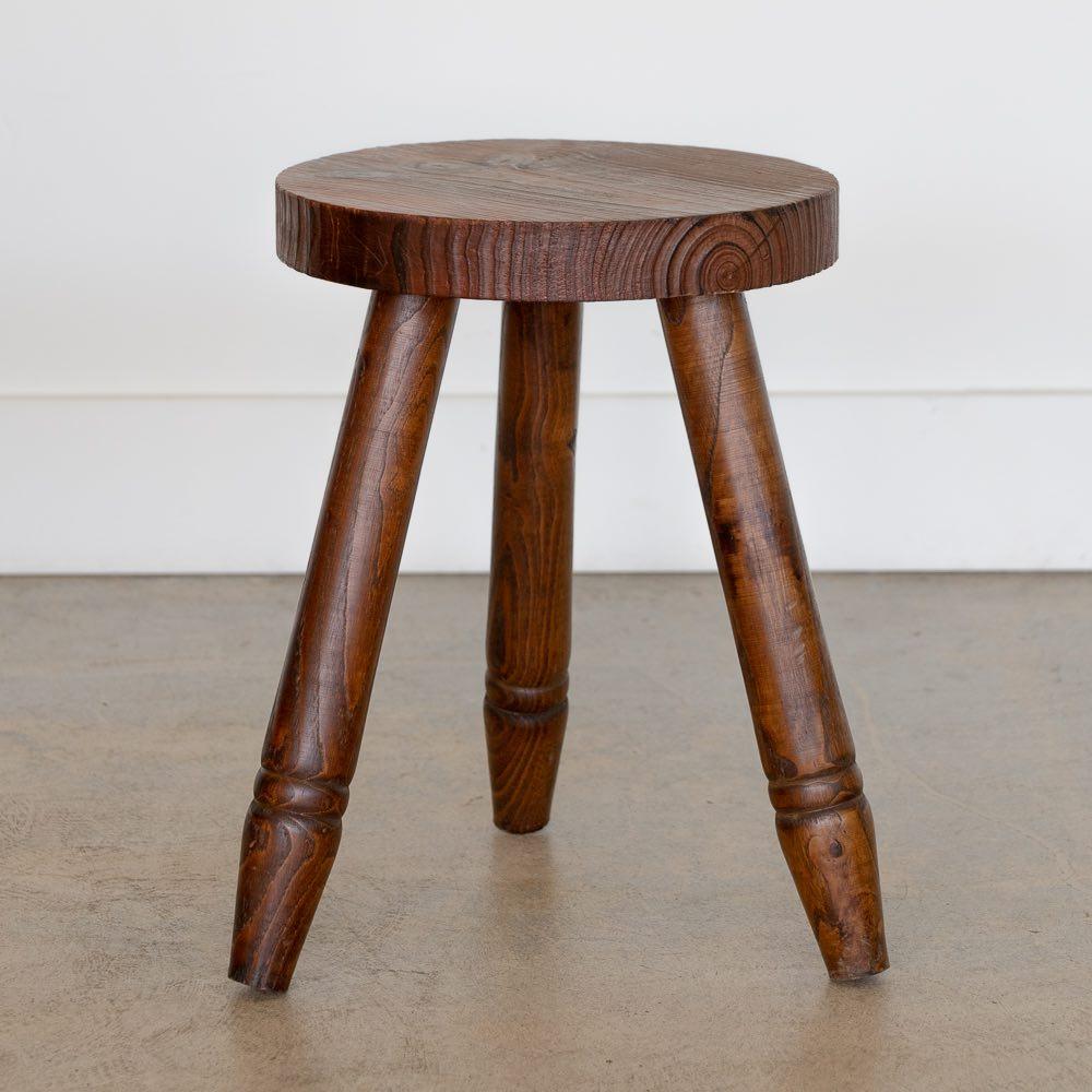 Vintage rustic wood tripod stool from France. Circular top and smooth wood legs with two-ring groove detail. Original finish shows nice age and patina. Can be used as stool or as side table next to chairs. 

