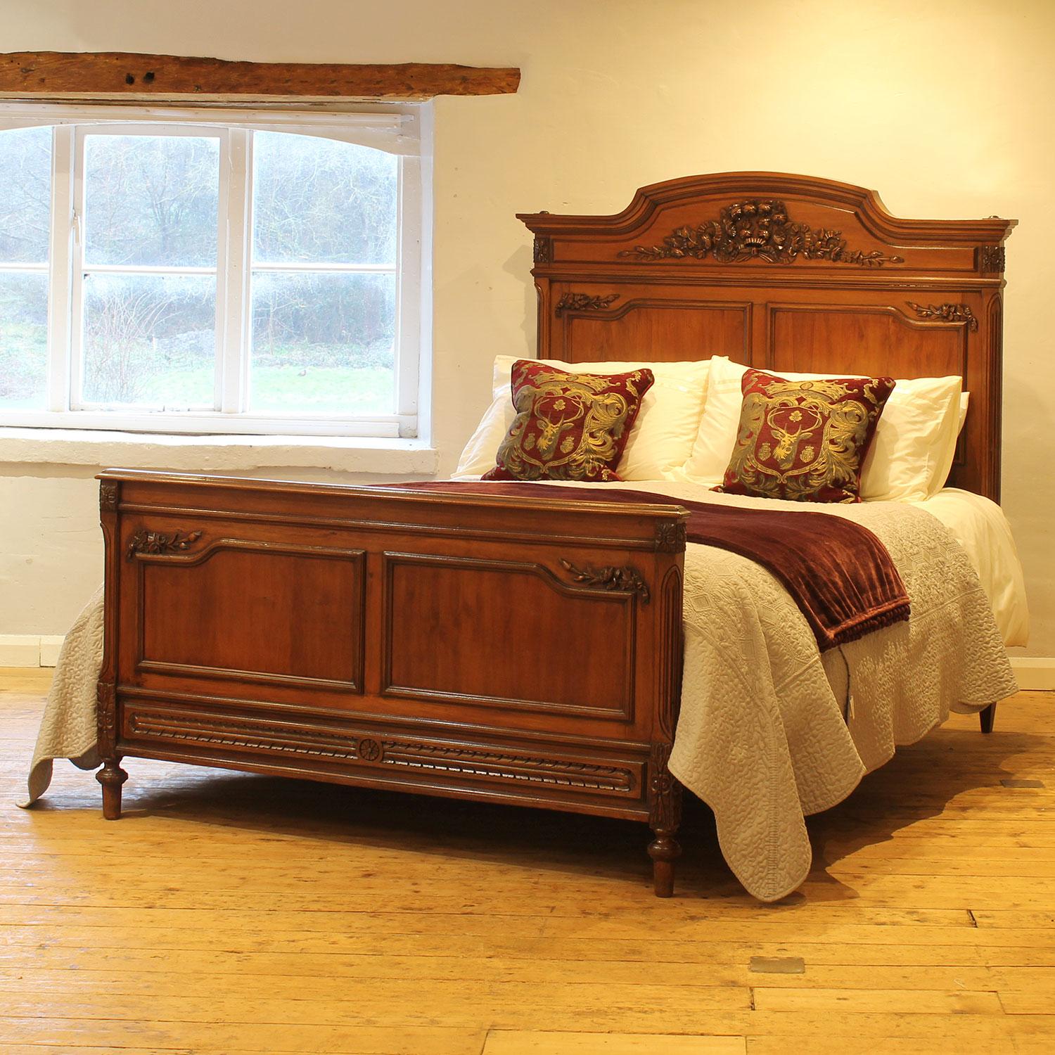 A fine example of a French bed from the early Twentieth Century with elegant shaping and fine carving.

This bed accepts a US Queen Size (or UK King Size), 5ft wide (60 in), base and mattress set.

The price includes a firm bed base for the bed