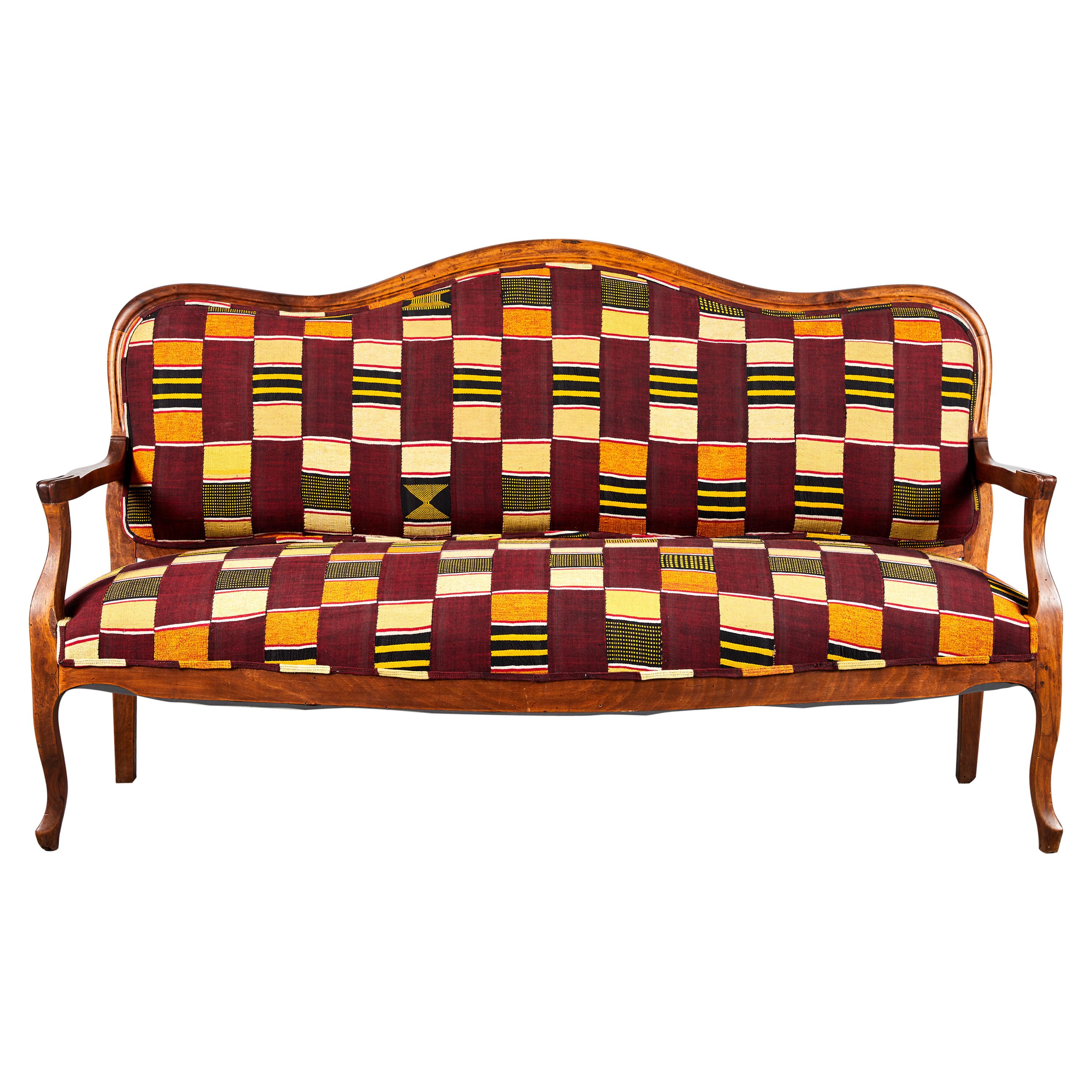 French Wooden Framed Camelback Bench in Ewe Fabric from Ghana