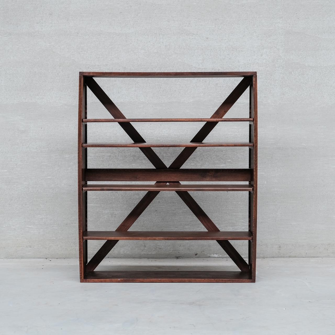 A simple refined wooden book case or open shelving. 

France, c1960s.

Well crafted, X-Framed to the reverse for support. 

Would sit well in a modern or a classic environment. 

Good condition generally. 

PRICES ARE EXCLUSIVE OF VAT IF SOLD IN THE