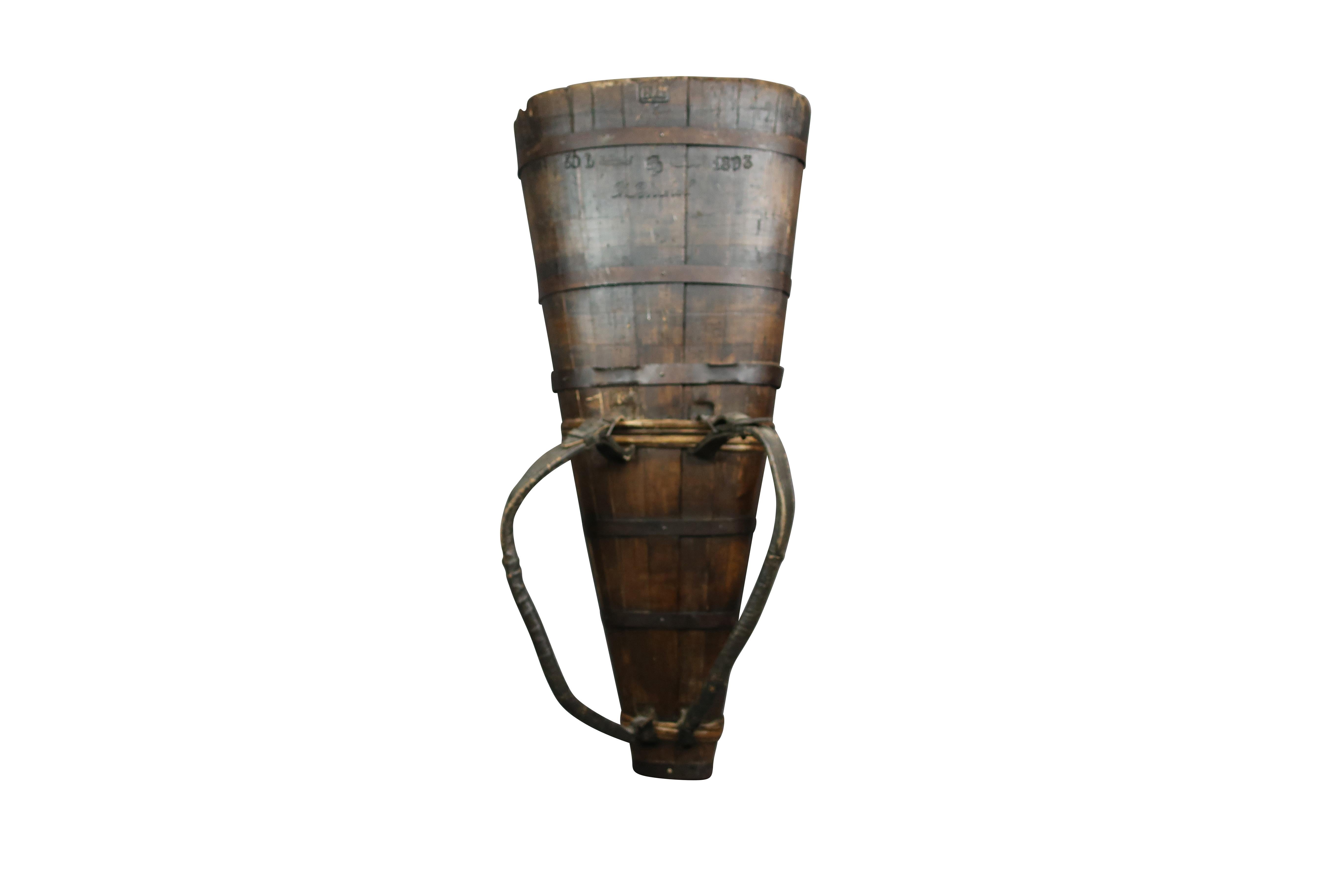 French wooden stave grape harvest basket/hotte, with iron strapping, and leather shoulder straps marked 1893 Chateau 