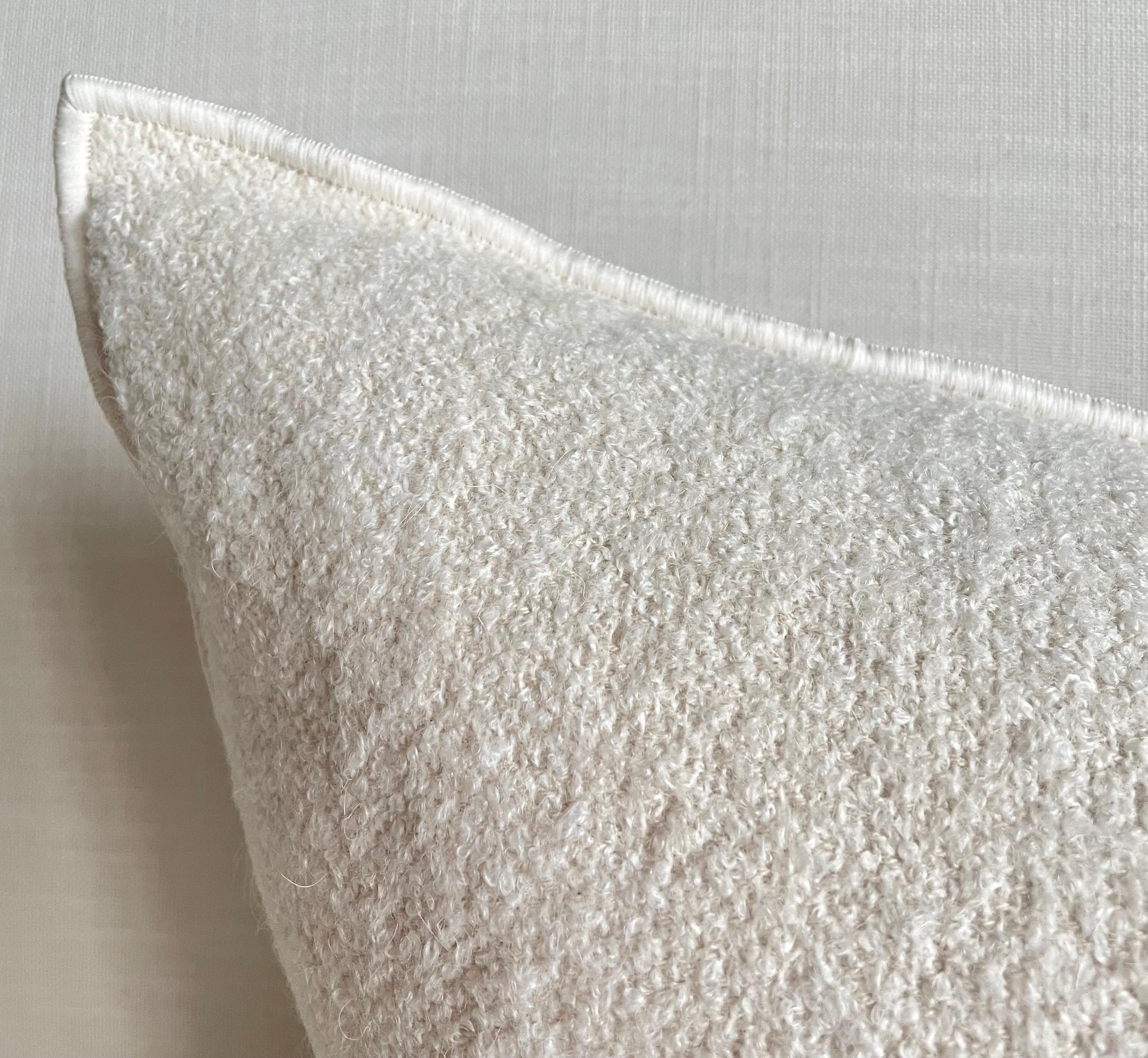 Custom wool blend accent pillow with down insert Color: Blanc 
 nubby boucle style pillow with a stitched edge, metal zipper closure. Our pillows are constructed with vintage one of a kind textiles from around the globe. Carefully constructed with