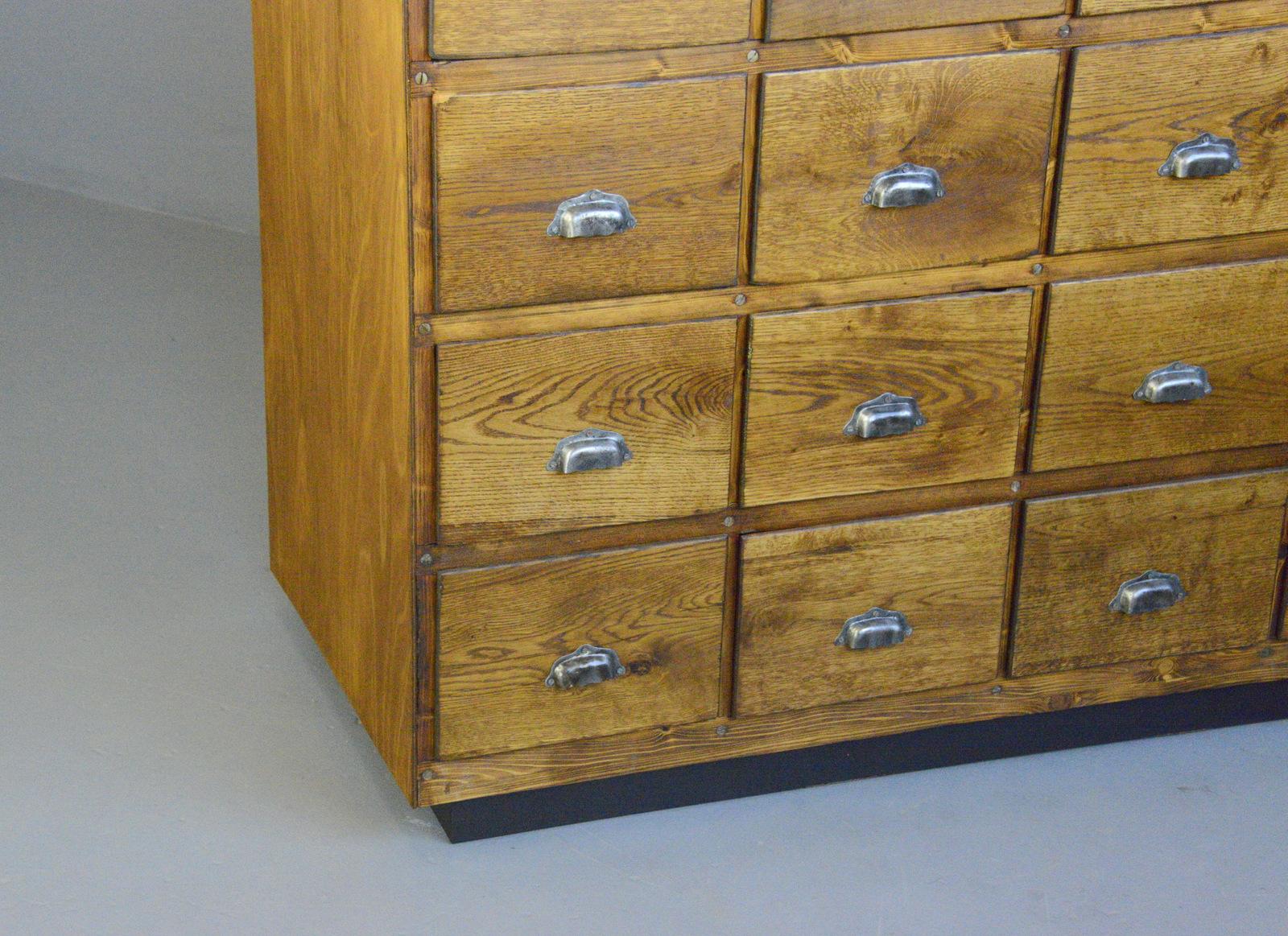 French workshop drawers, Circa 1930s

- Solid oak drawer fronts
- Solid pine sides and frame
- Original steel cup handles
- 24 large drawers
- Drawers have their original metal rollers
- French ~ 1930s
- 139cm wide x 65cm deep x 166cm
