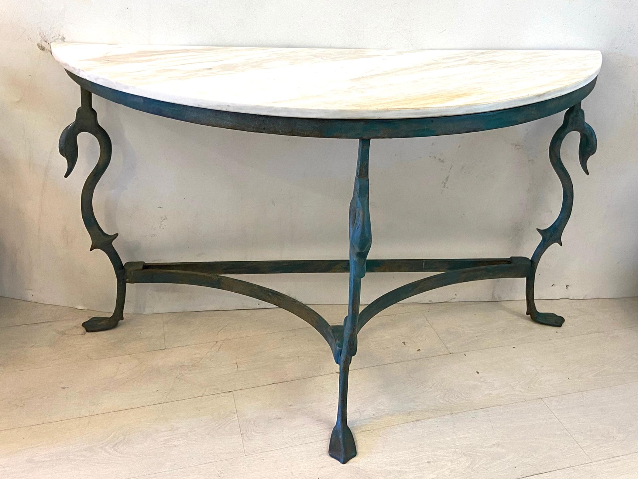 French midcentury wrought and cast iron with marble top demilune swan table. Three leg table each with a swan and webbed foot. Greenish bronze colored finish. 51 inches wide by 19 deep by 30 high.
