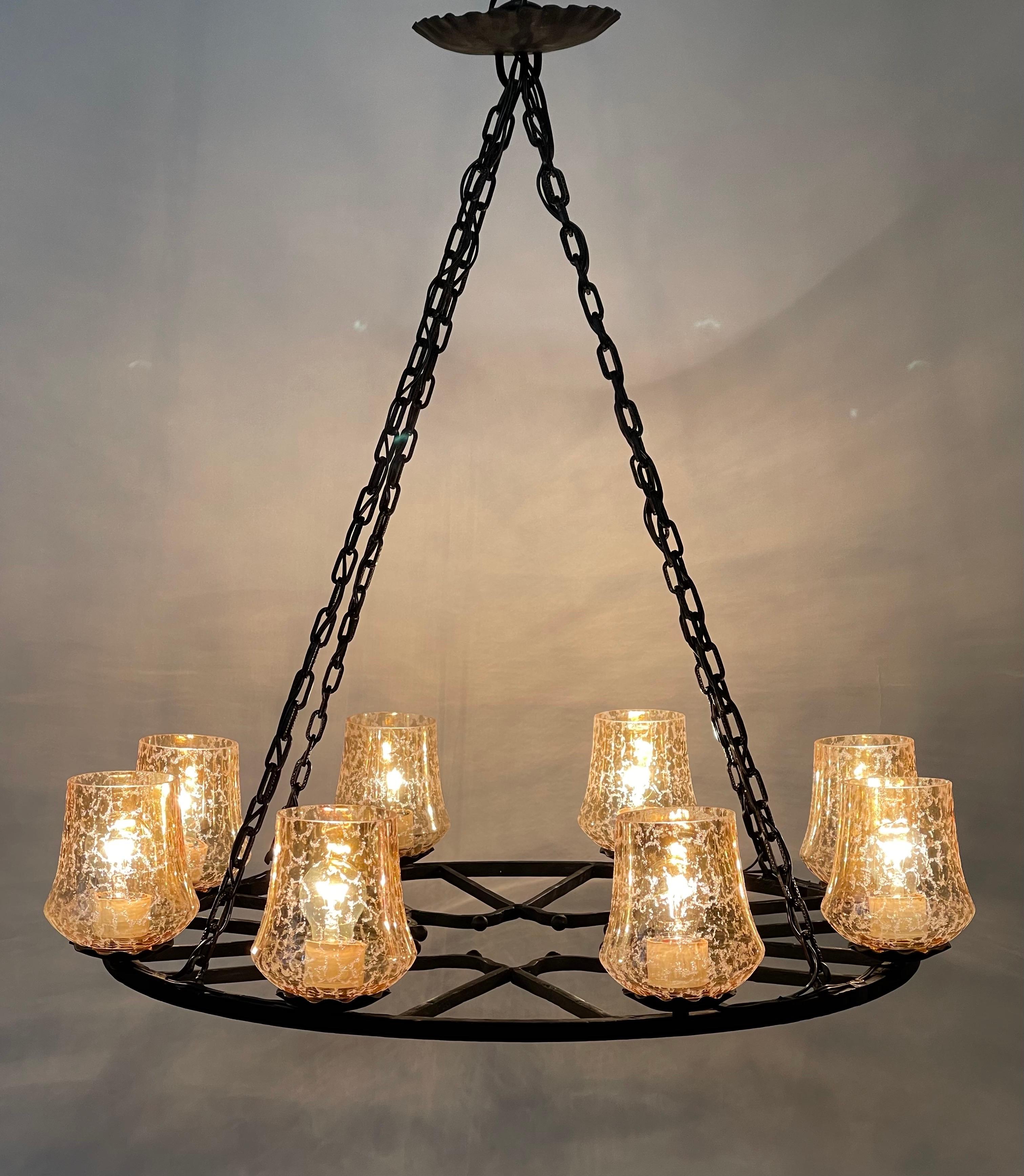 Gilt French Wrought Iron and Amber Glass Chandelier, circa 1950s