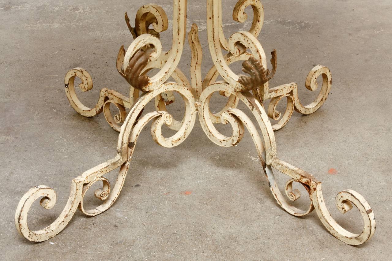 French Wrought Iron and Marble Bistro Table In Distressed Condition In Rio Vista, CA