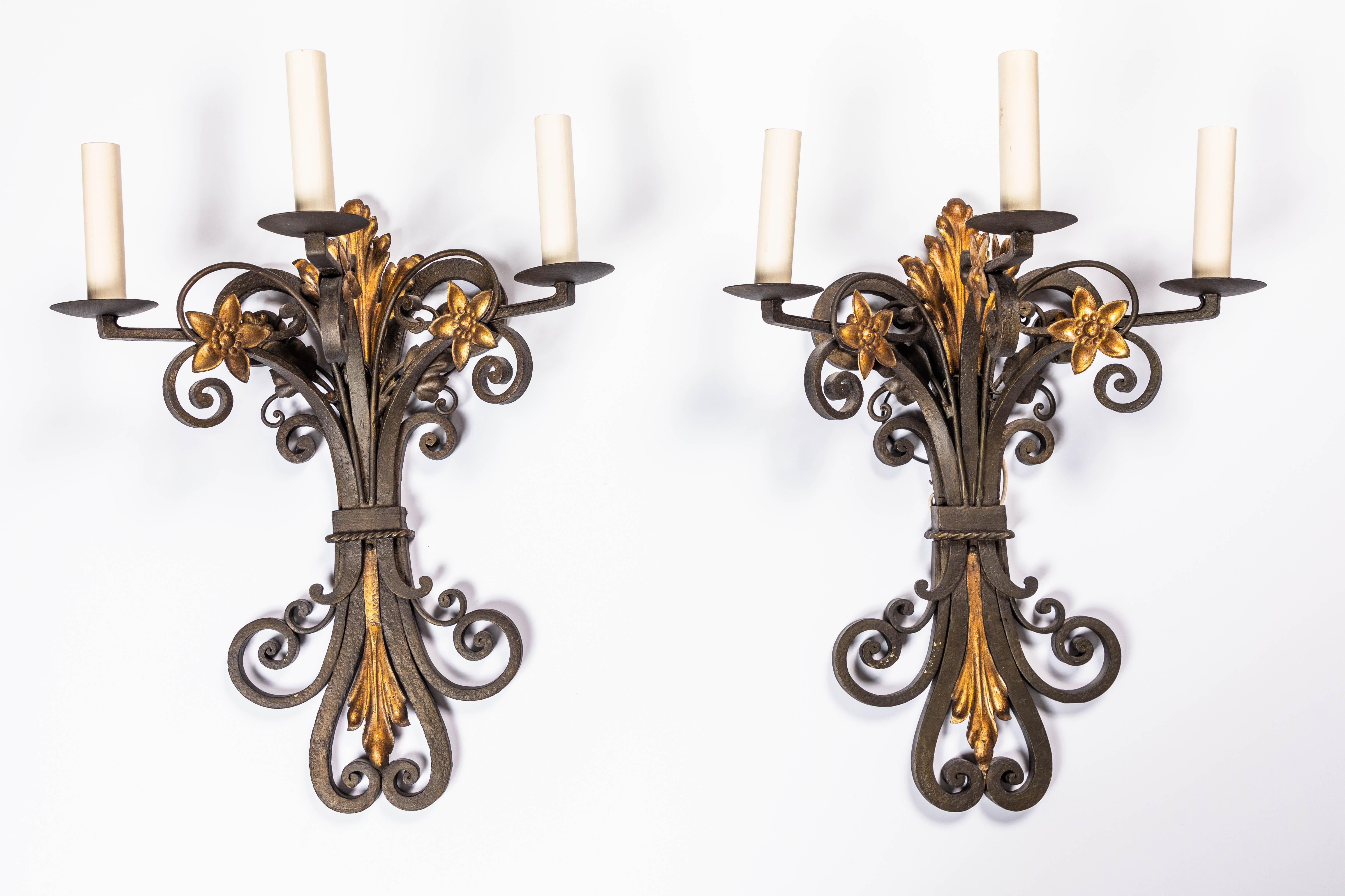 French wrought iron and parcel gilt 3-light sconces with shades, from Los Angeles estate, 1930s. Beautiful patina.