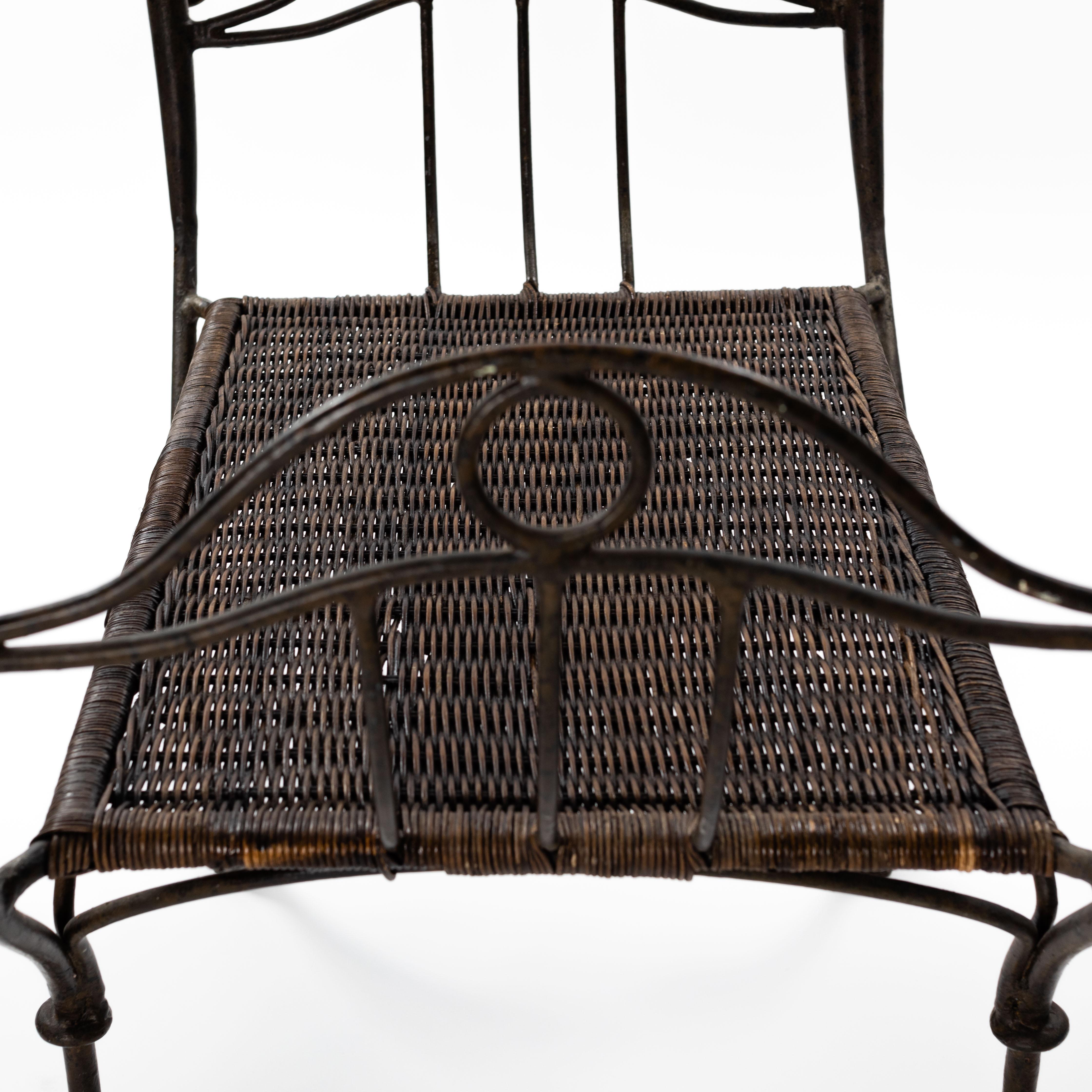 Hand-Crafted French Wrought Iron Bench with Ratan Seat Wickerwork from the 1940s