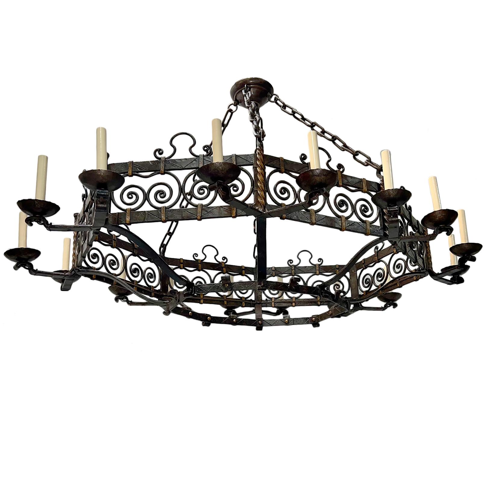 A circa 1950's French iron chandelier with 16 lights.

Measurements:
Drop:33