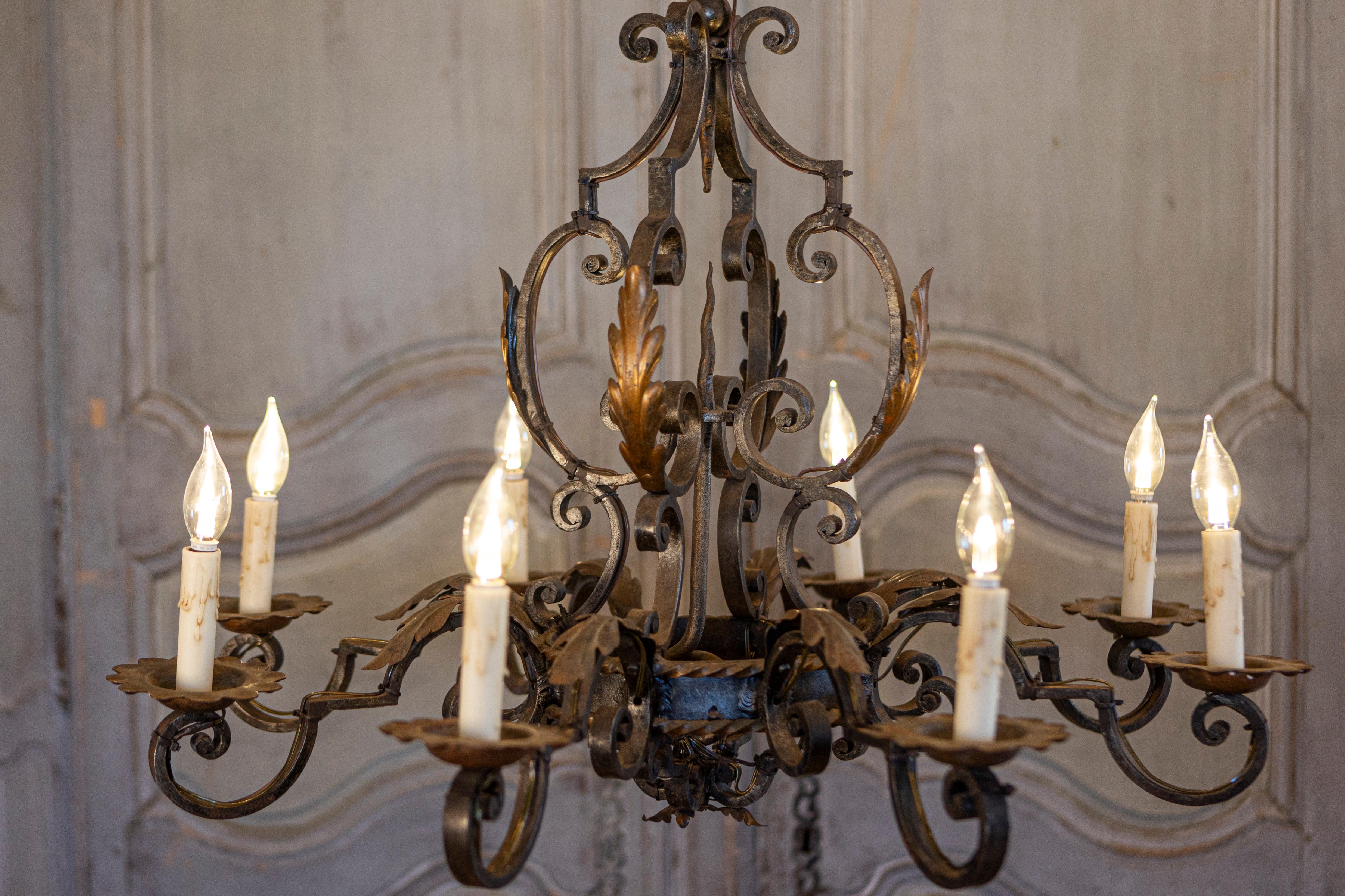 French Wrought Iron Eight-Light Chandelier with Scrolling Arms and Acanthus Leaf In Good Condition For Sale In Atlanta, GA
