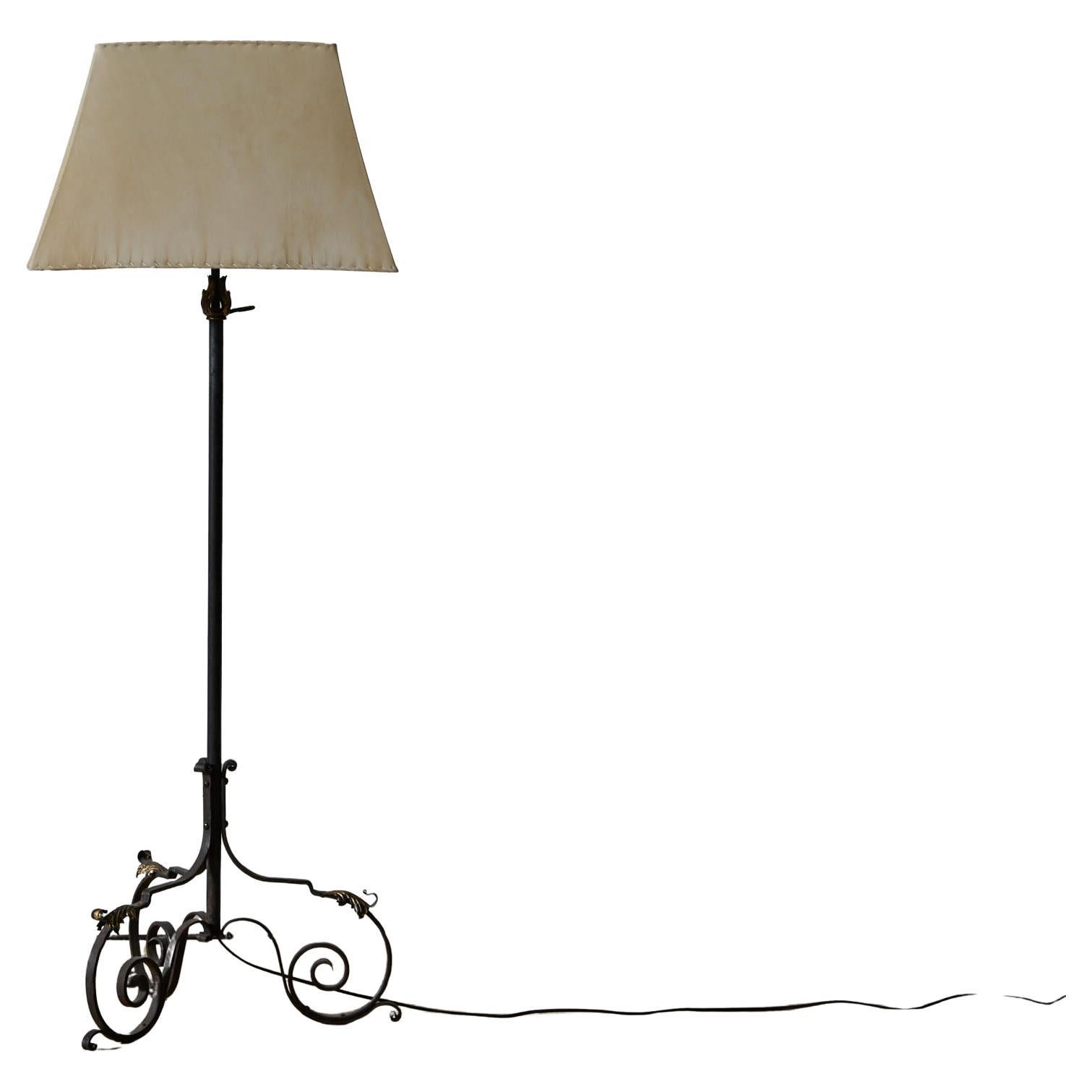 French Wrought Iron Floor Lamp with Gilding and Parchment Shade For Sale
