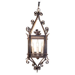 Vintage French Wrought-Iron Four Light Lantern with Scrolling and Openwork Motifs