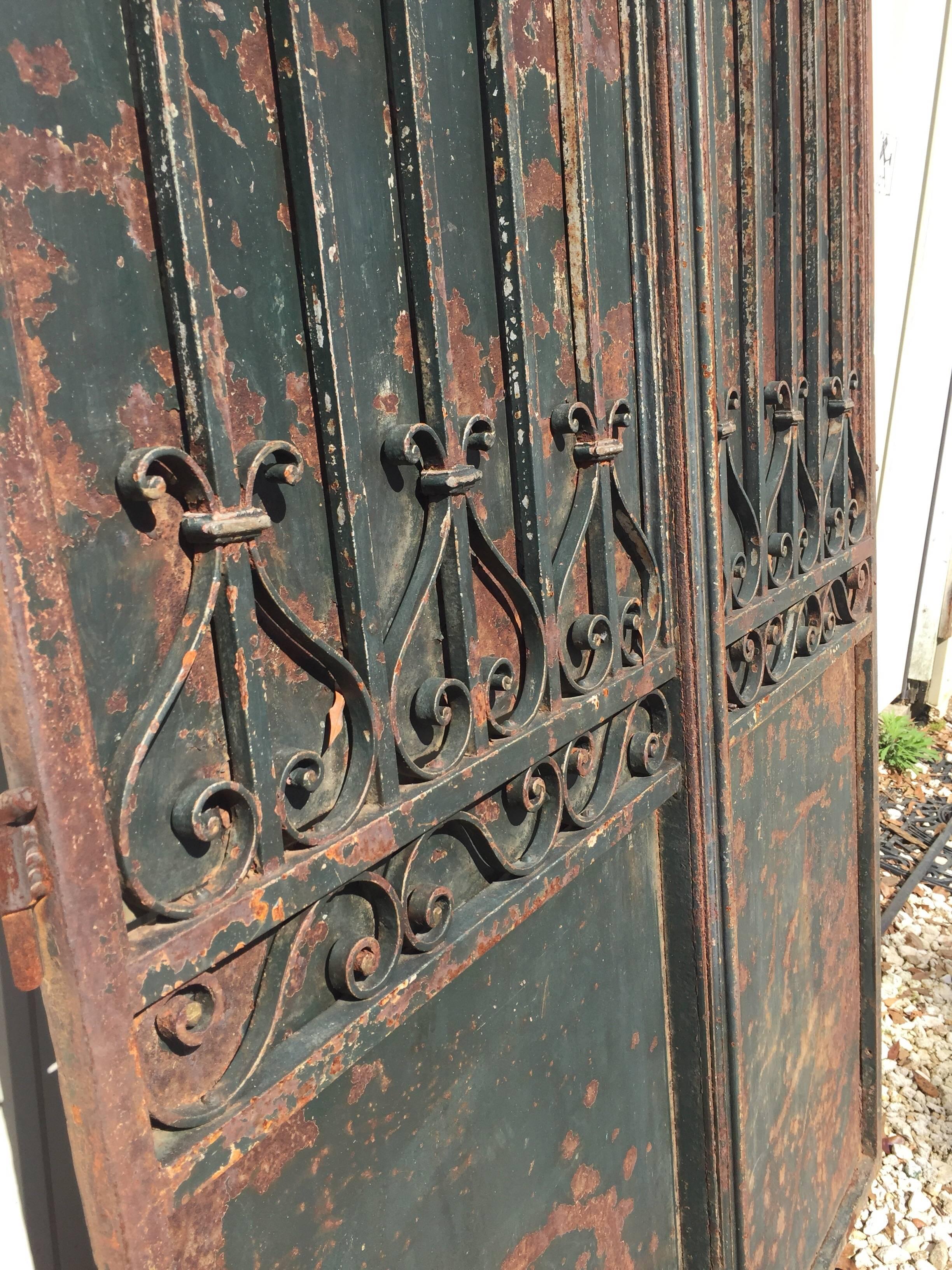 An exceptional pair of French 19th century garden gates from the Provenance region of France. Created with expert craftsmanship, these gates are of outstanding quality with a terrific patina. This gate does not include hardware or keys.