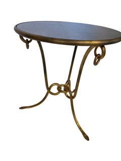 Table d'extrémité en fer forgé doré à la manière de René Drout