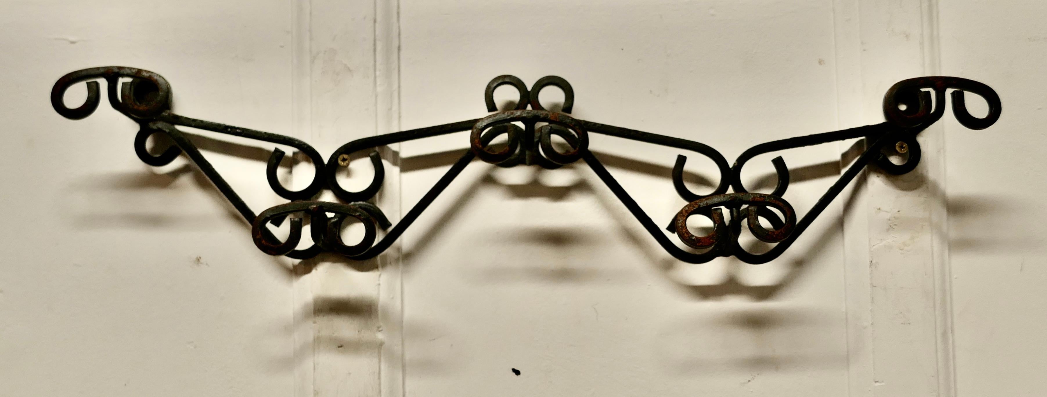 French Wrought Iron Hat and Coat Rack

 This is a heavy quality piece in wrought iron with 5 hooks

A very useful piece for a cloakroom or hall 

The rack is in good condition, it is 7” tall, 27” wide and 3” deep
SC71