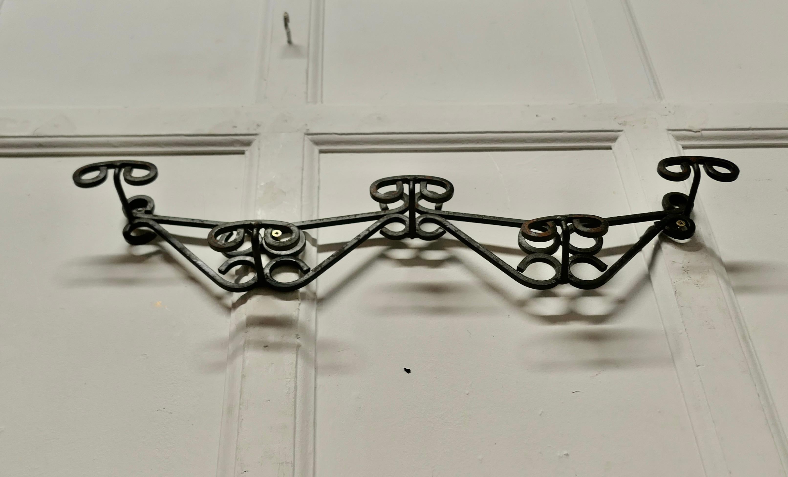 Arts and Crafts French Wrought Iron Hat and Coat Rack   This is a heavy quality piece in wrought For Sale