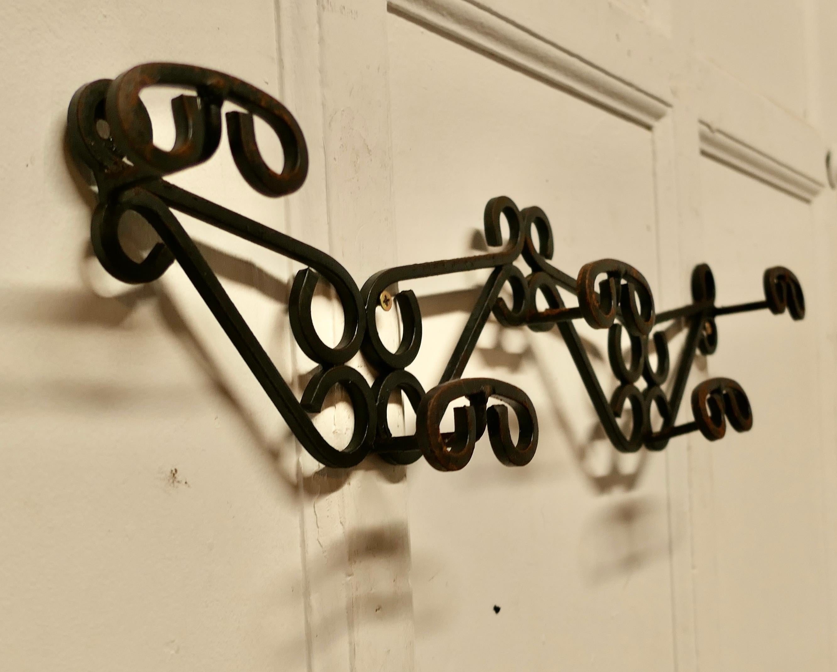 Early 20th Century French Wrought Iron Hat and Coat Rack   This is a heavy quality piece in wrought For Sale