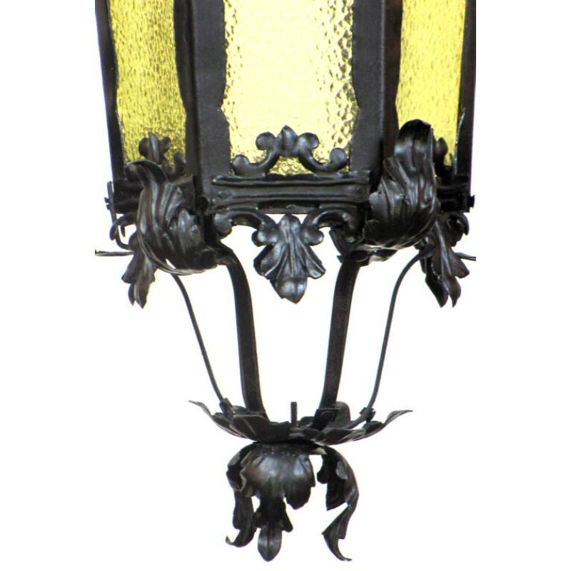 Wrought iron lantern with textured amber glass panels. French. Early 20th Century

Dimensions: 
Height: 40
Width (Diameter): 14.