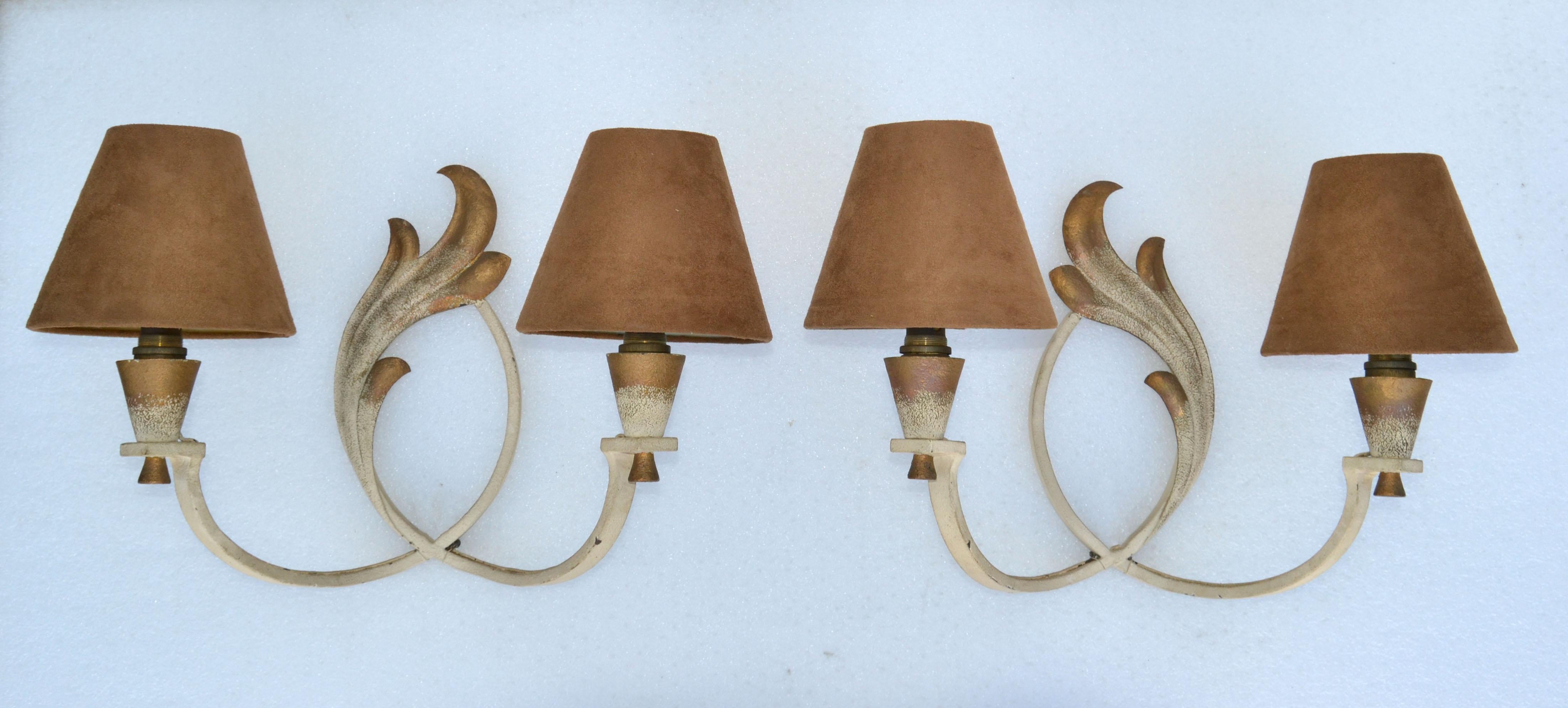 Superb pair of Italian Art Deco wrought iron sconces, wall lights with beige and Gold Finish, designed by Riccardo Scarpa in the late 1950s.
They come with custom-made brown Ultrasuede shades.
US rewired and in working condition each Sconce takes