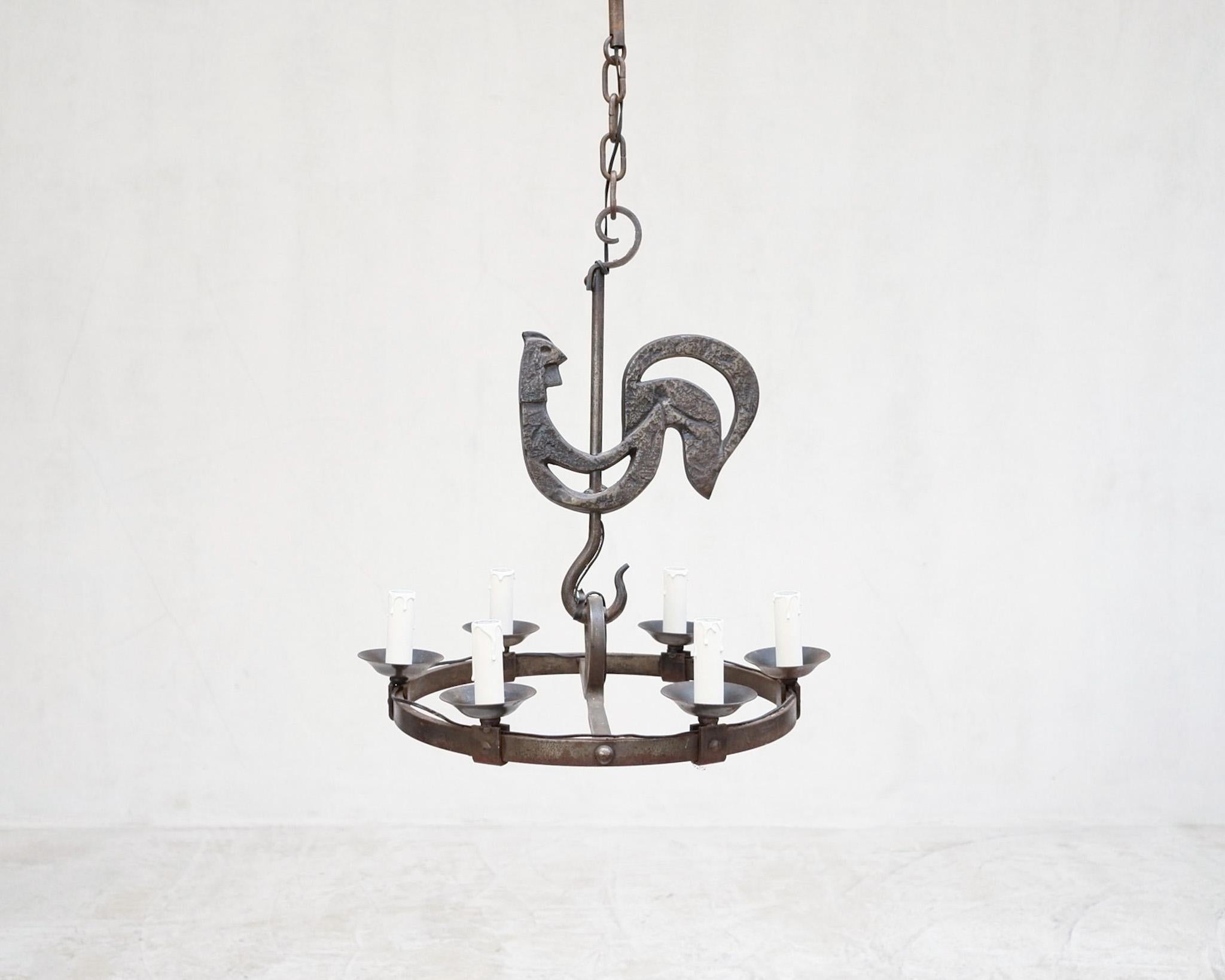 Striking chandelier by Jean Touret for Atelier Marolles.

Made of Wrought by the artisans of Marolles, France C.1950 

Fantastic quality.

-

We offer free shipping to the USA/Canada through Fedex with this item.